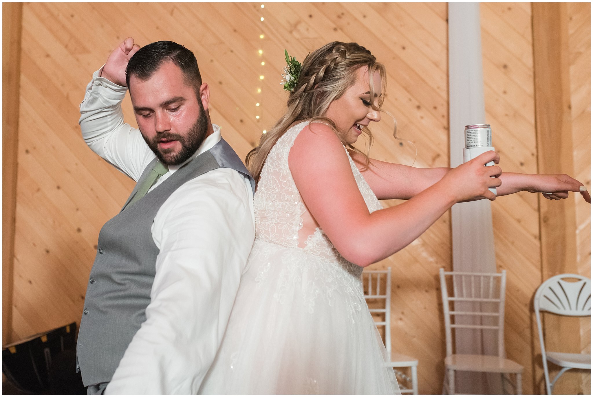 Party dancing in a barn during wedding reception | Sage Green and Gray Summer Wedding at Oak Hills | Jessie and Dallin Photography