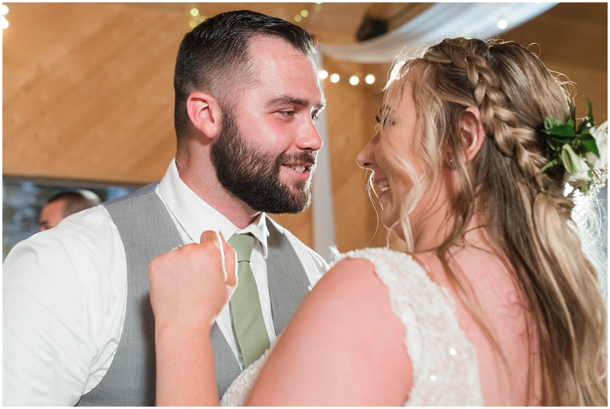 Party dancing in a barn during wedding reception | Sage Green and Gray Summer Wedding at Oak Hills | Jessie and Dallin Photography