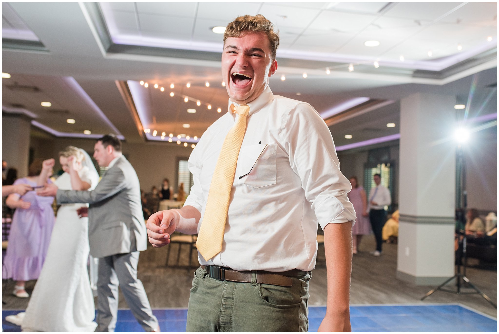 Party and group dancing during Fountain View Event Venue reception details | Fountain View Event Venue and Bountiful Temple Wedding | Jessie and Dallin Photography