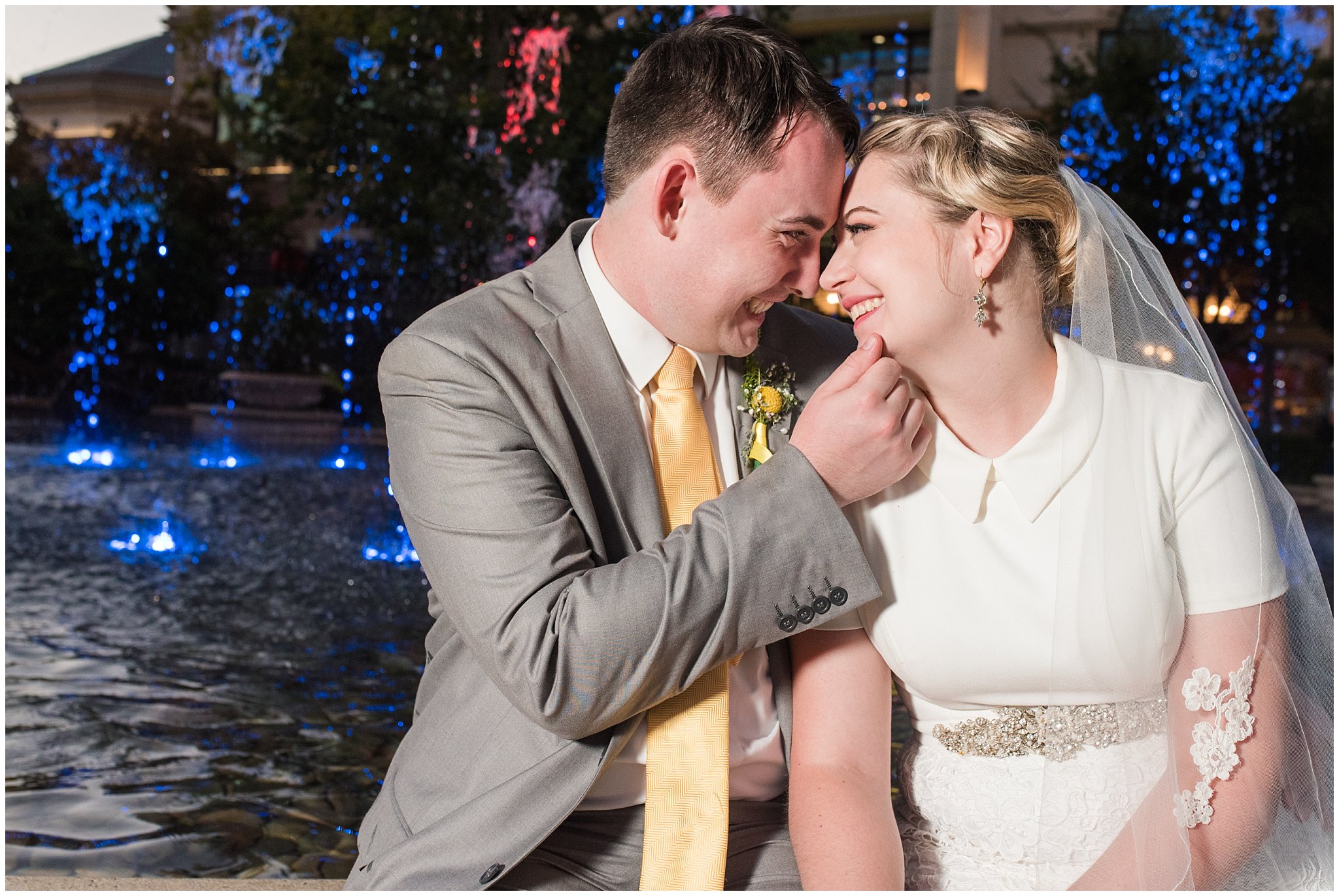 Outdoor fountain bride and groom portraits at night with fountains at Fountain View Event Venue at Station Park | Fountain View Event Venue and Bountiful Temple Wedding | Jessie and Dallin Photography