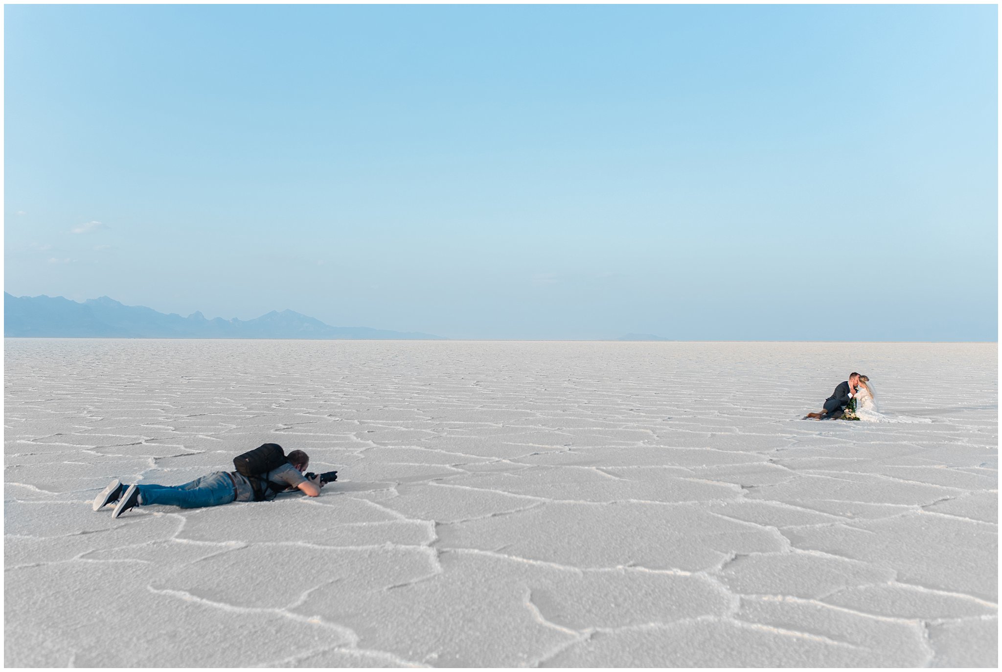 Dallin laying on the Salt Flats for photo