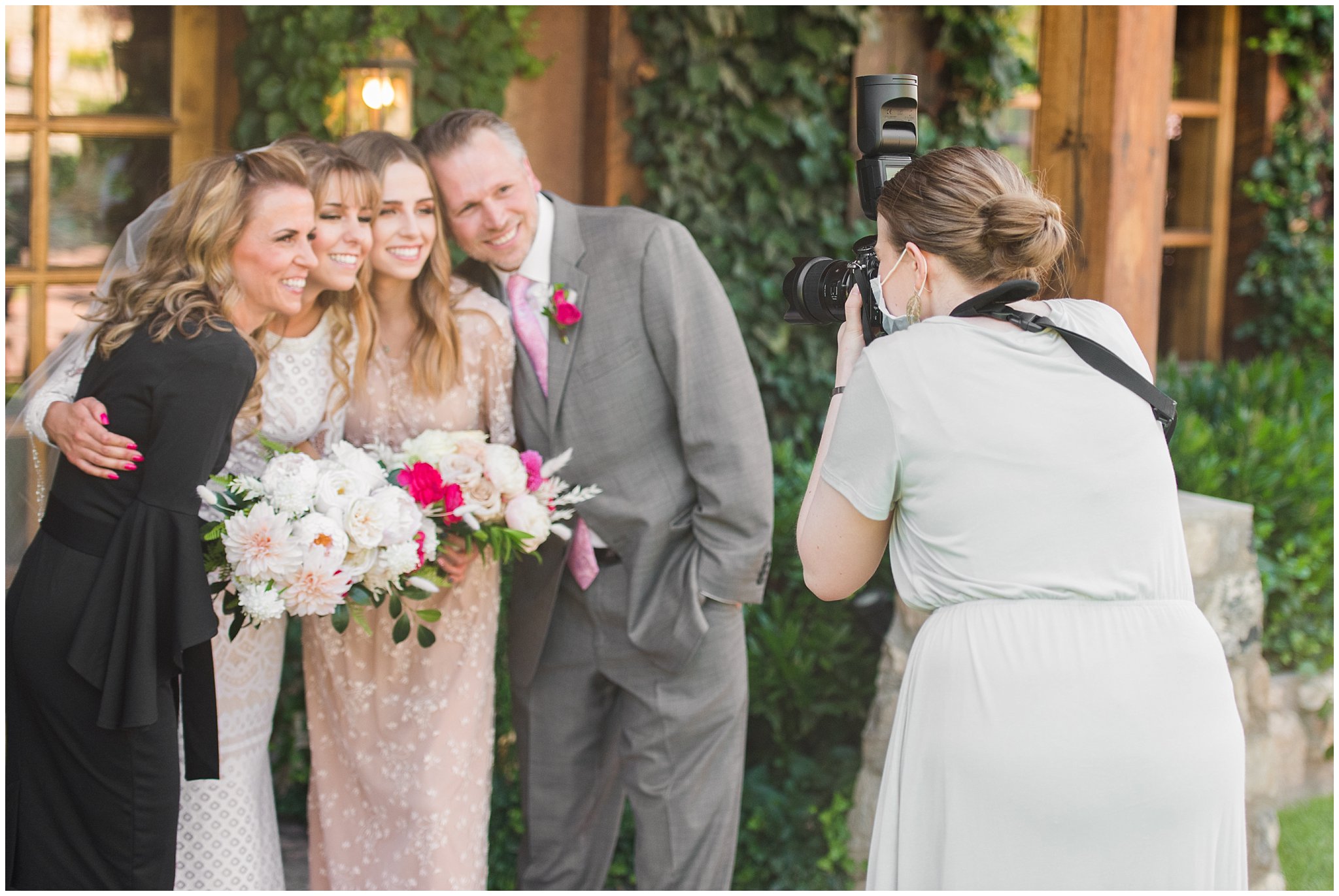 Jessie photographing family photo at wedding