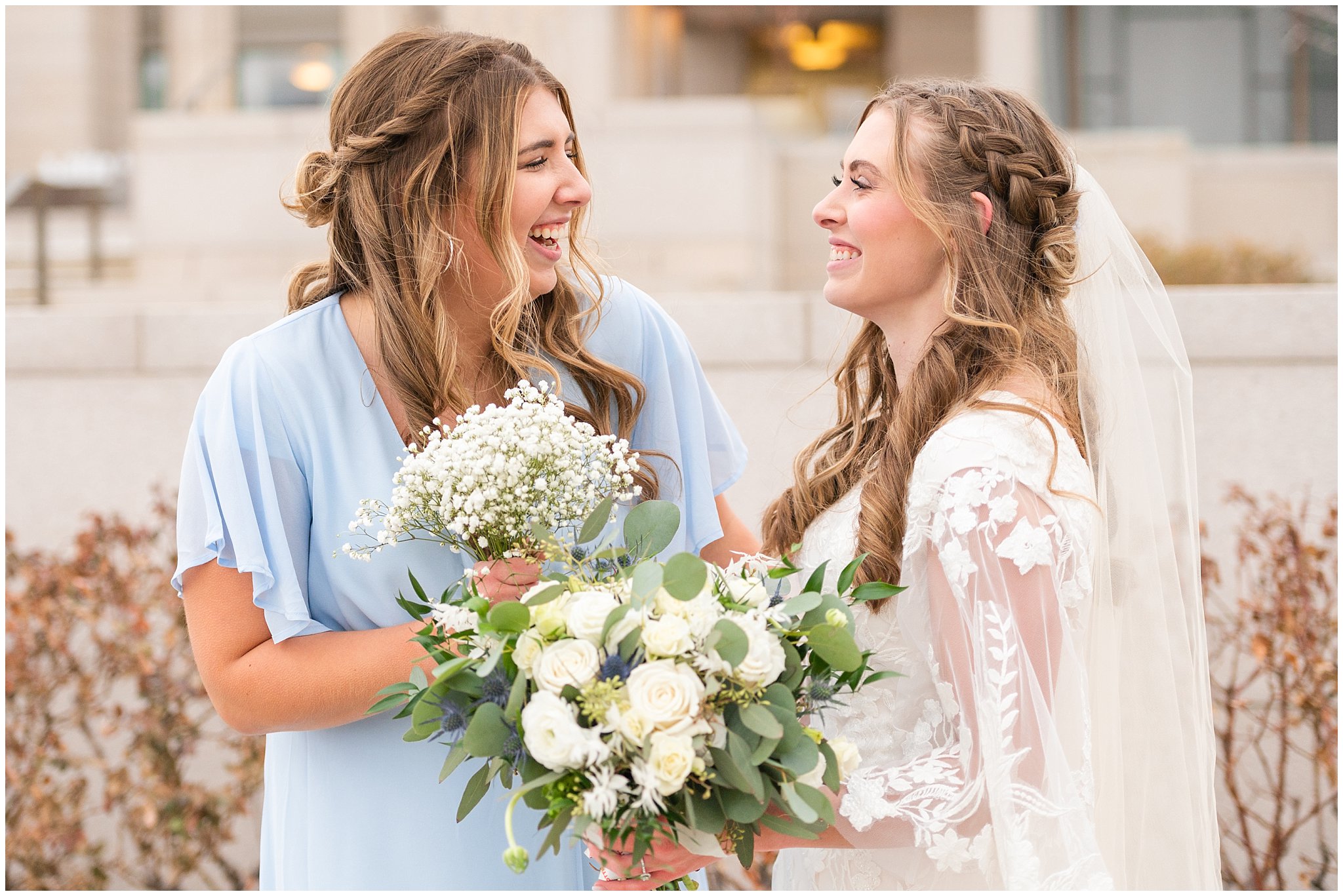 Bride with bridesmaids in light blue dresses with white bouquets | Oquirrh Mountain Temple and Draper Day Barn Winter Wedding | Jessie and Dallin Photography
