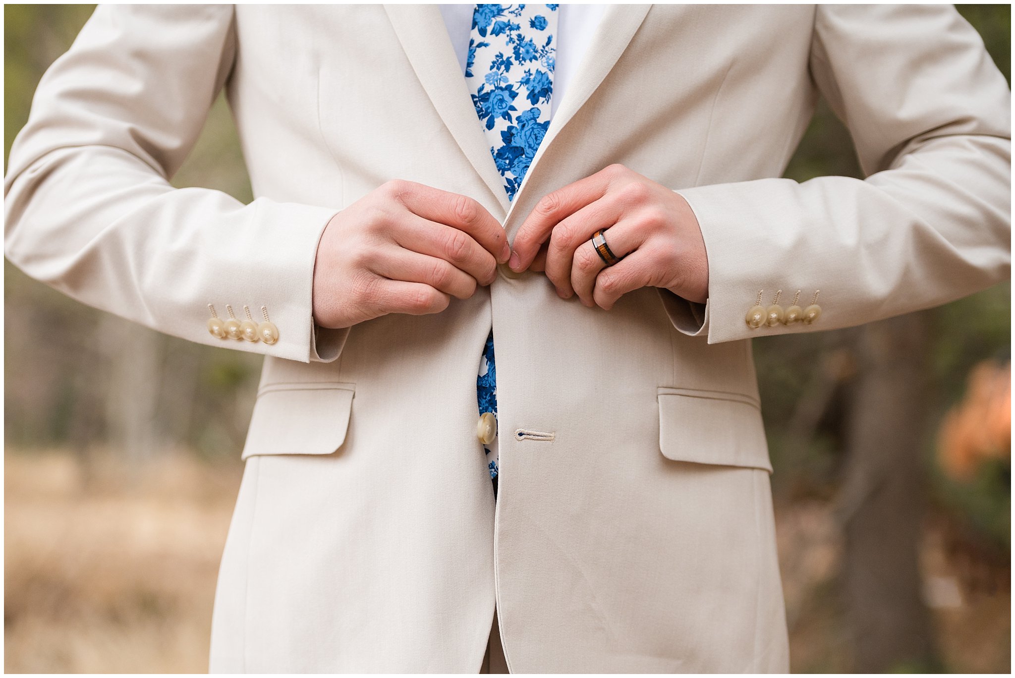 Groom in the mountains wearing creme colored suit with blue tie | Tibble Fork Winter Formal Session | Jessie and Dallin Photography