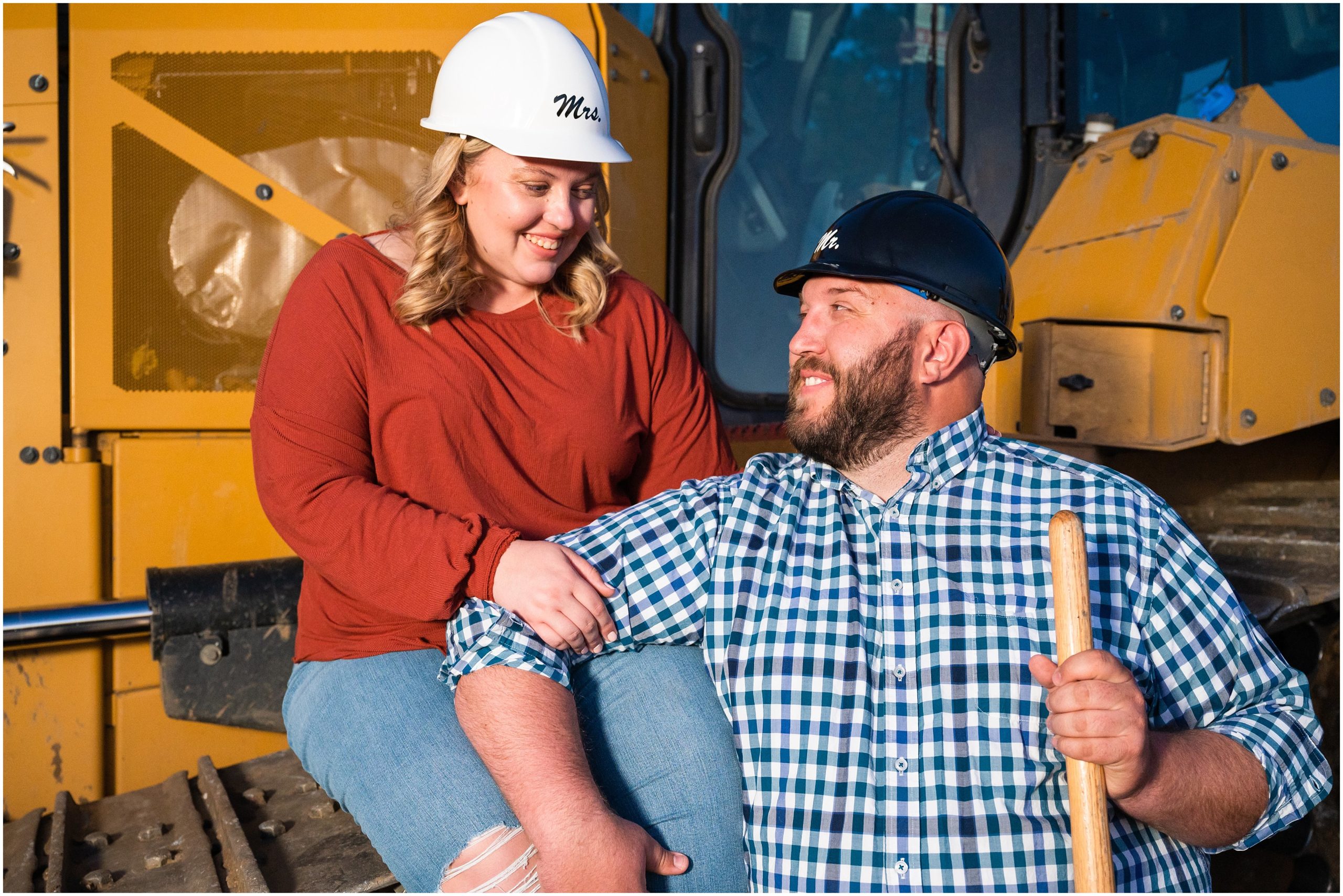 Couple in matching bride and groom construction helmets at construction site during Utah Mountain and Construction Site Engagement Session | Jessie and Dallin Photography