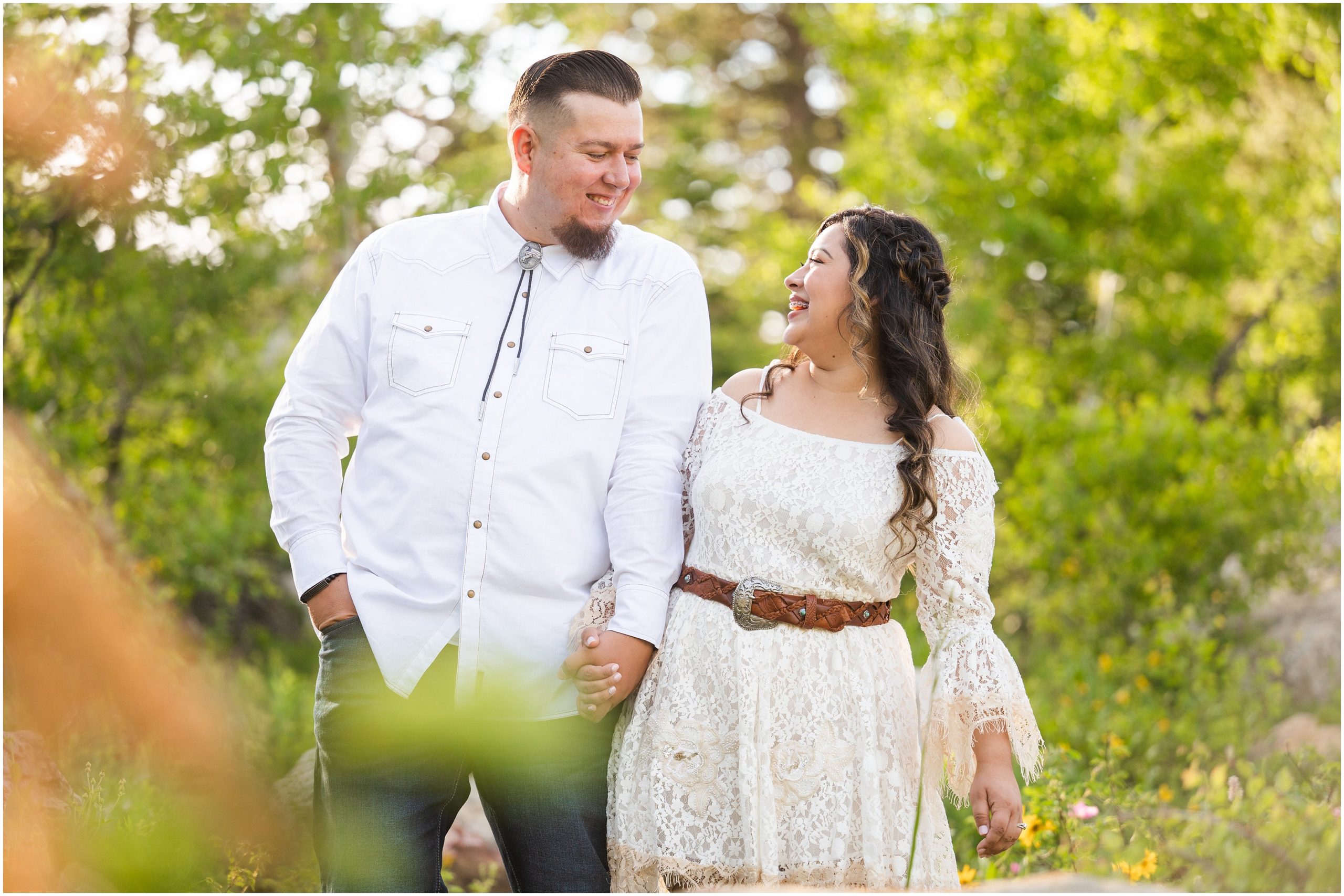 Couple in western outfits during engagement session | Tony Grove Western Destination Engagement