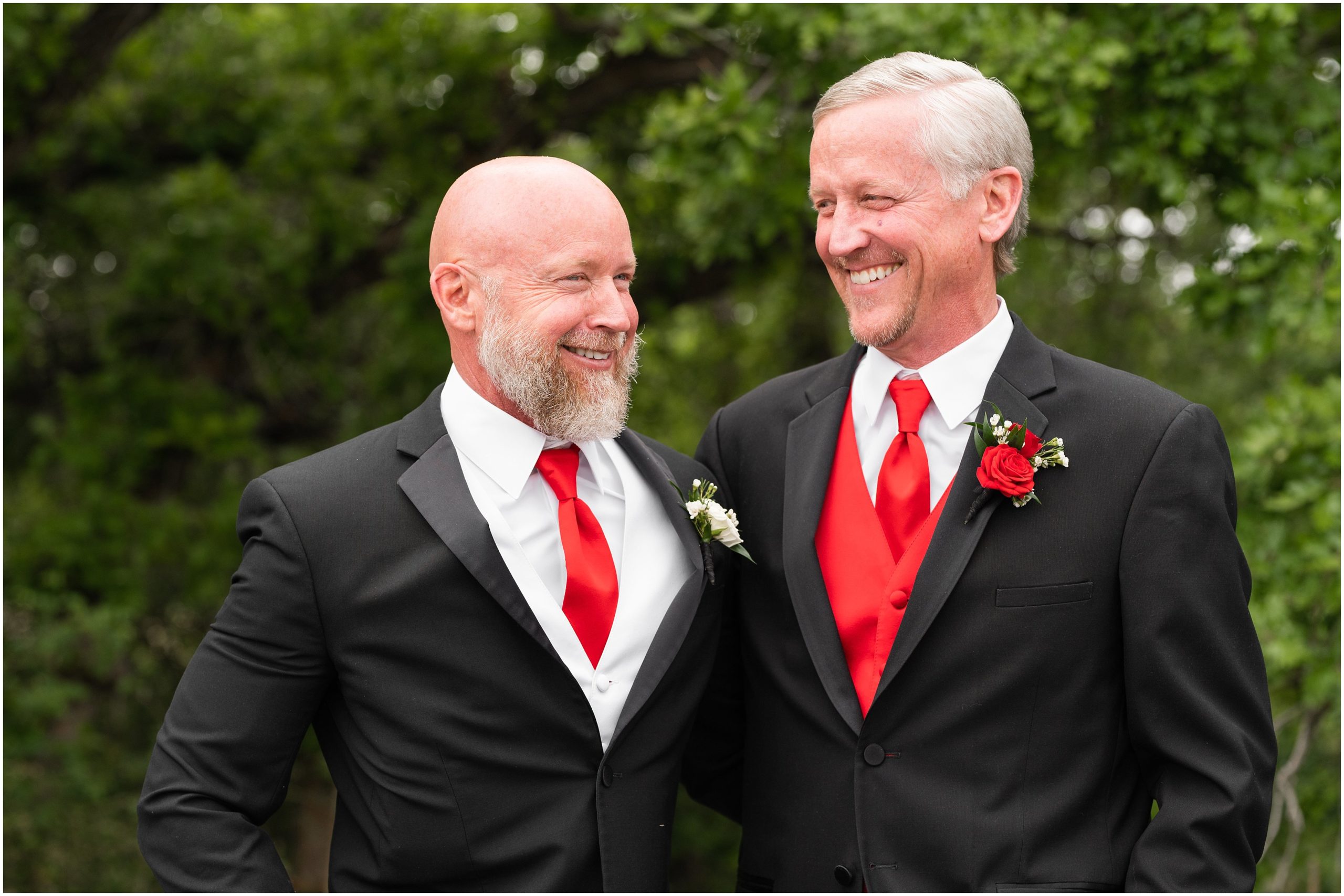 Groom and groomsmen photos with red tie and black suits and University of Utah socks | Red and Black Oak Hills Utah Spring Wedding | Jessie and Dallin Photography
