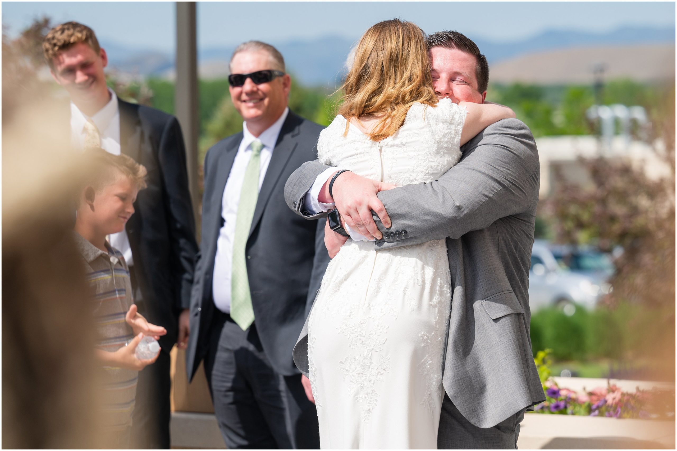 Bride hugs brother | Payson Temple and White Willow Wedding | Jessie and Dallin Photography