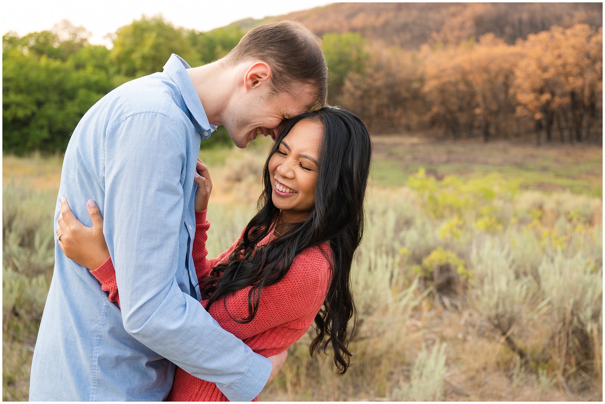 Couple laughing in the mountains | Summer Utah Mountain Engagement | Jessie and Dallin Photography