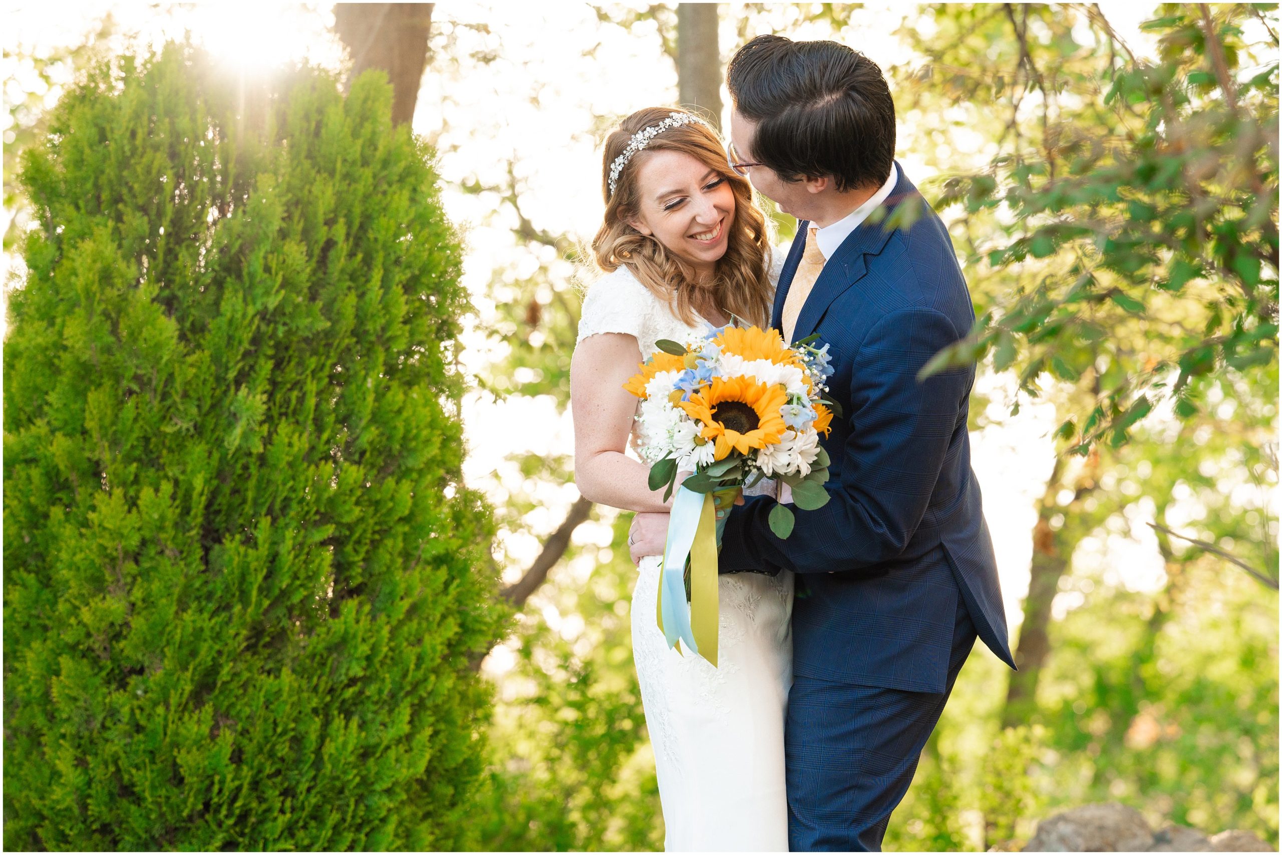 Bride and Groom wearing Converse shoes, navy suit with yellow tie, and sunflower bouquet in Salt Lake City | International Peace Gardens Formal Session | Jessie and Dallin Photography