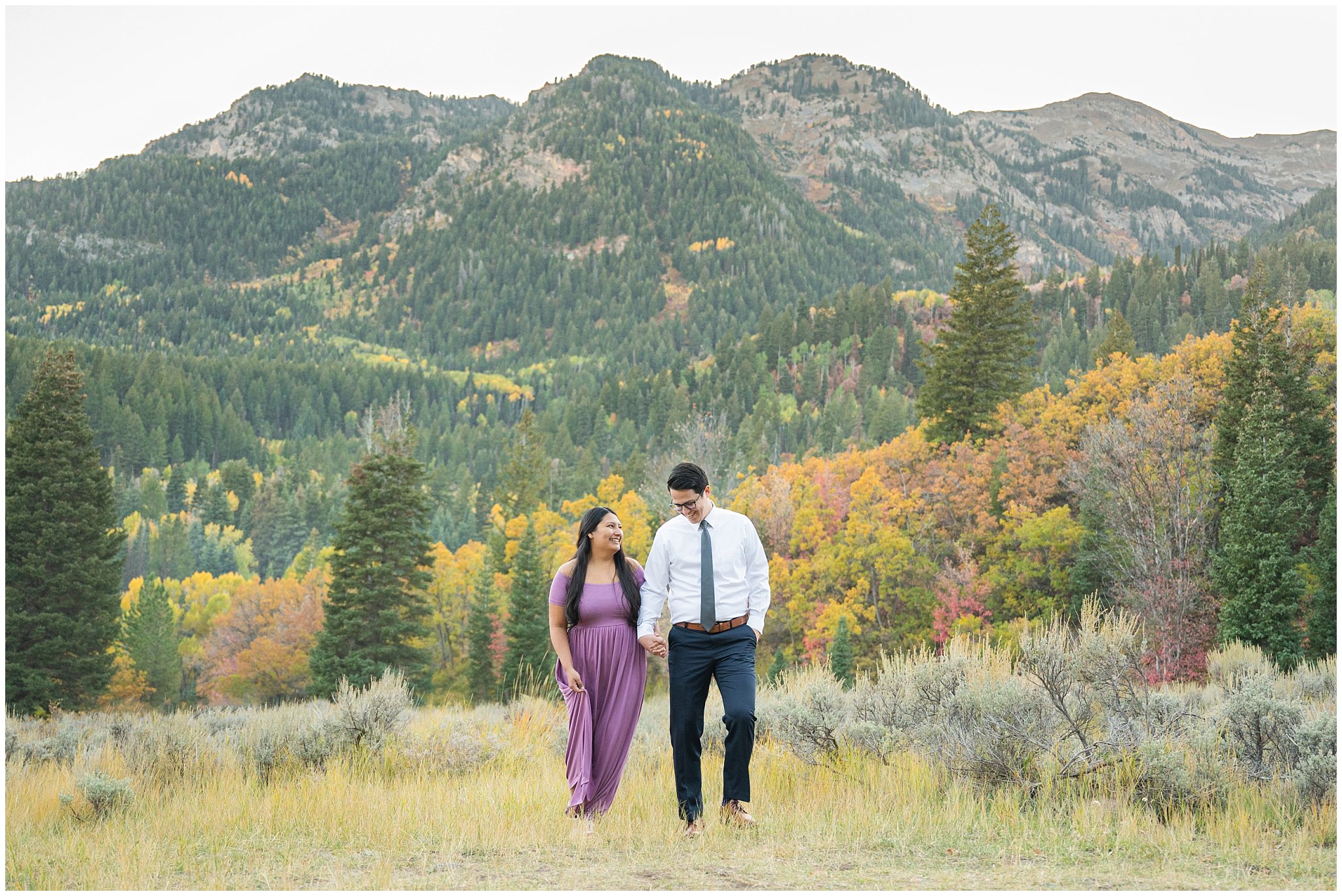 Couple dressed in dress and shirt and tie in the Utah mountains with fall leaves | Tibble Fork Fall Engagement Session | Jessie and Dallin Photography
