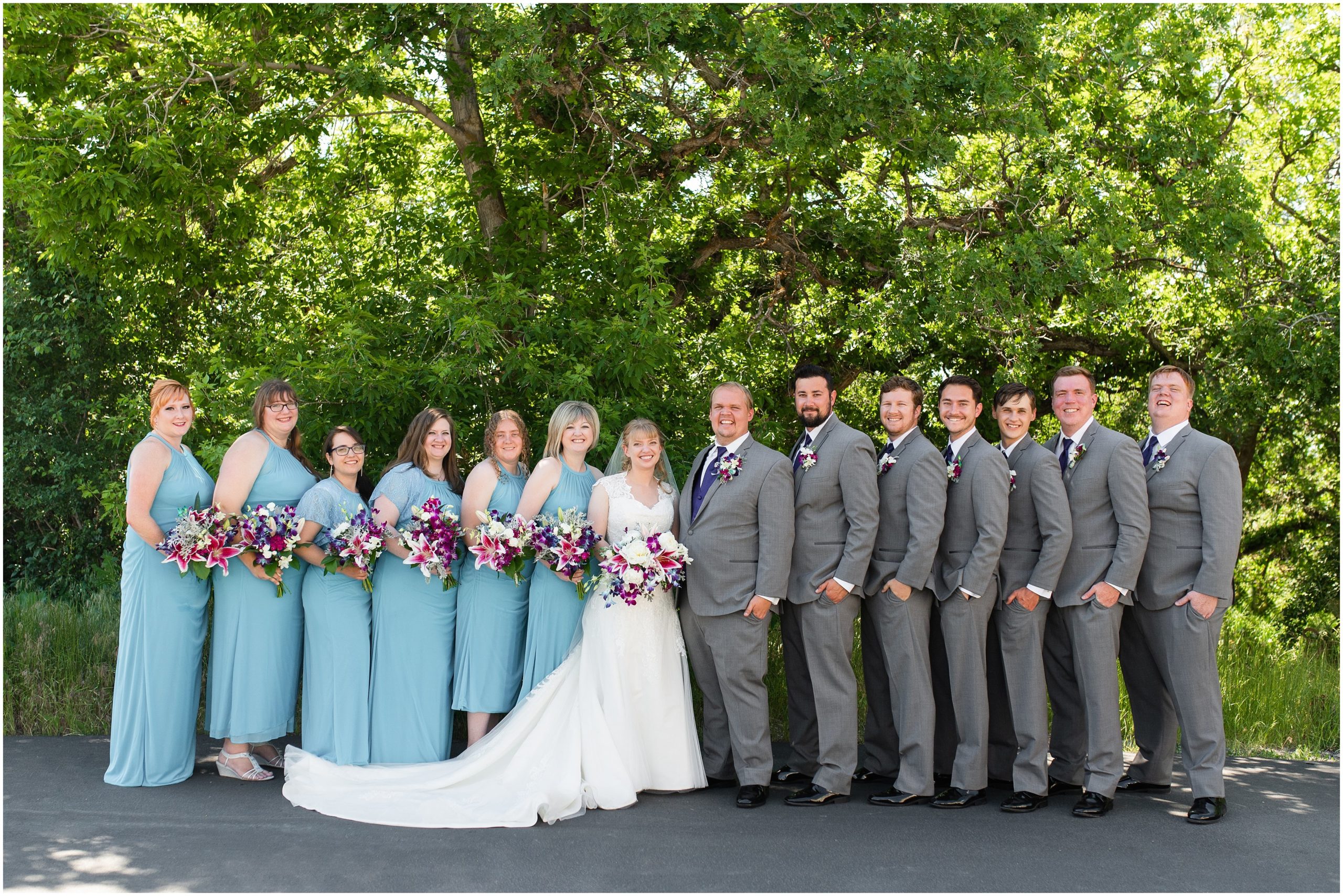 Bridesmaids in Malibu blue dresses with orchid bouquets and Groomsmen in grey suits and purple vests and ties | Orchid Inspired Summer Wedding at Oak Hills Utah | Jessie and Dallin Photography