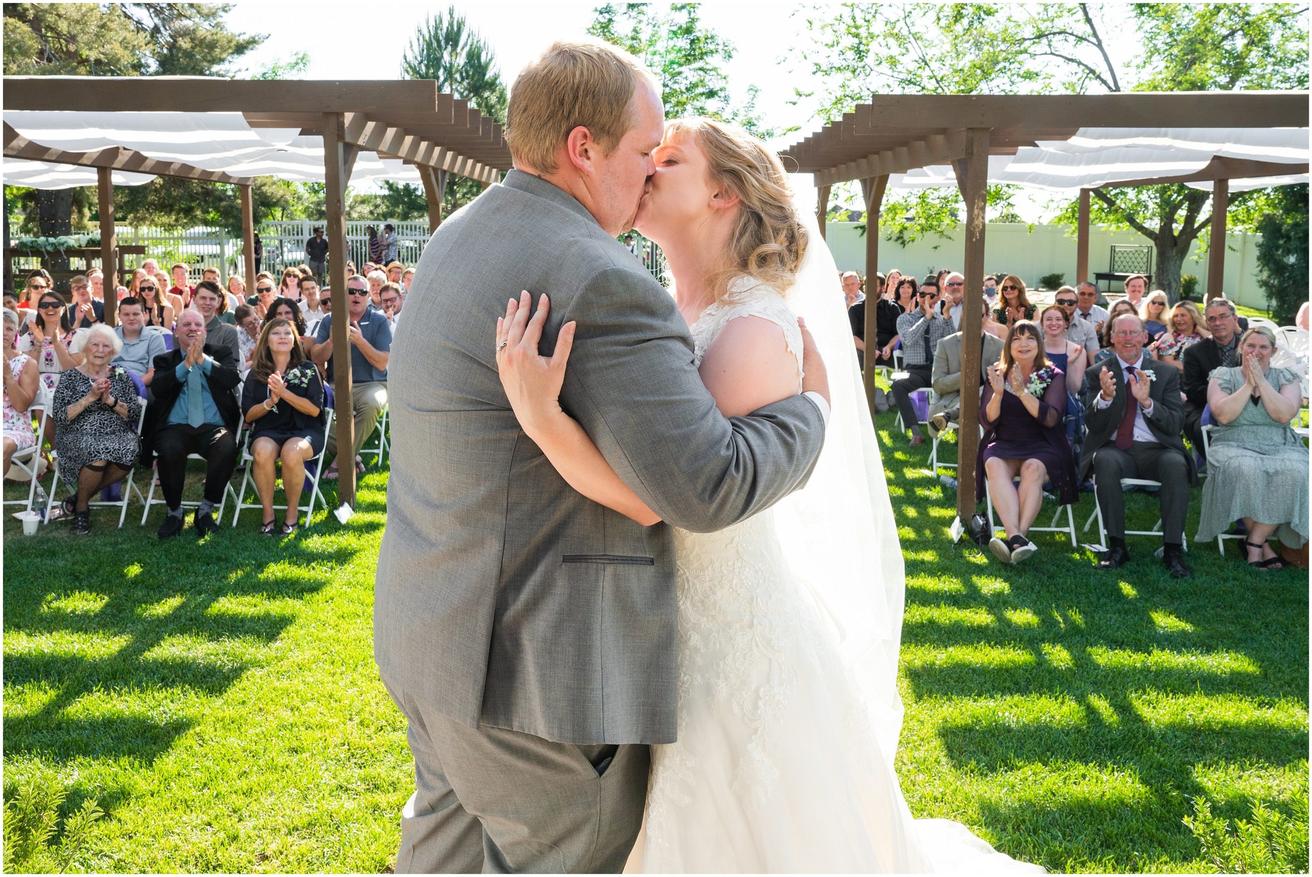Bride and Groom during ceremony with mountain views | Orchid Inspired Summer Wedding at Oak Hills Utah | Jessie and Dallin Photography
