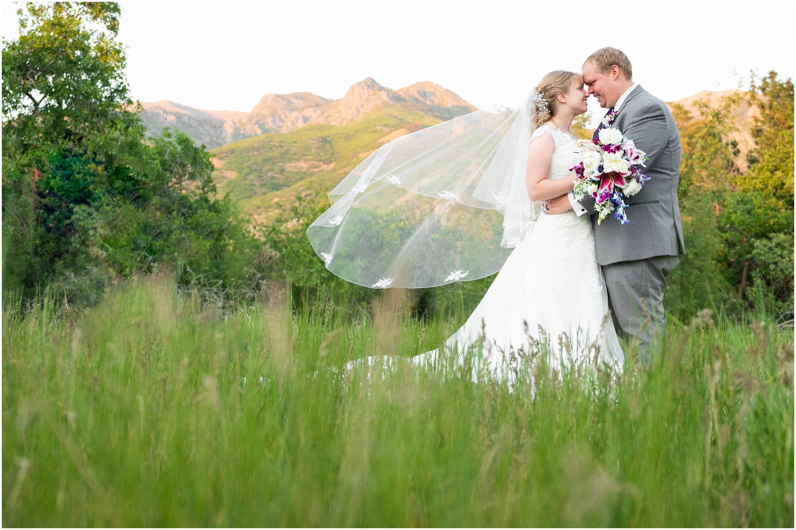 Bride and groom portraits in from of trees and mountains | Orchid Inspired Summer Wedding at Oak Hills Utah | Jessie and Dallin Photography