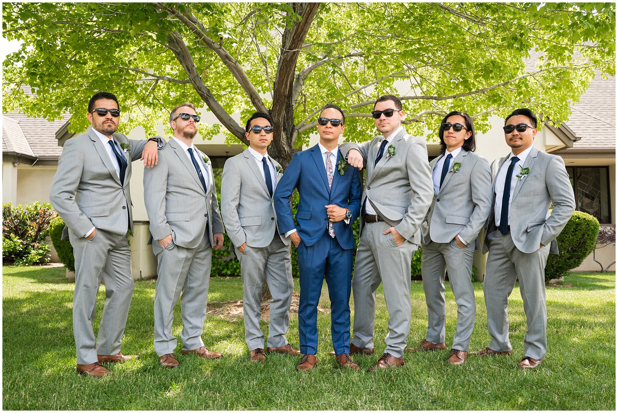 Wedding party portraits with groomsmen in blue and grey suits and bridesmaids in pink dresses | Cactus and Tropicals and Salt Lake Church Wedding | Jessie and Dallin Photography