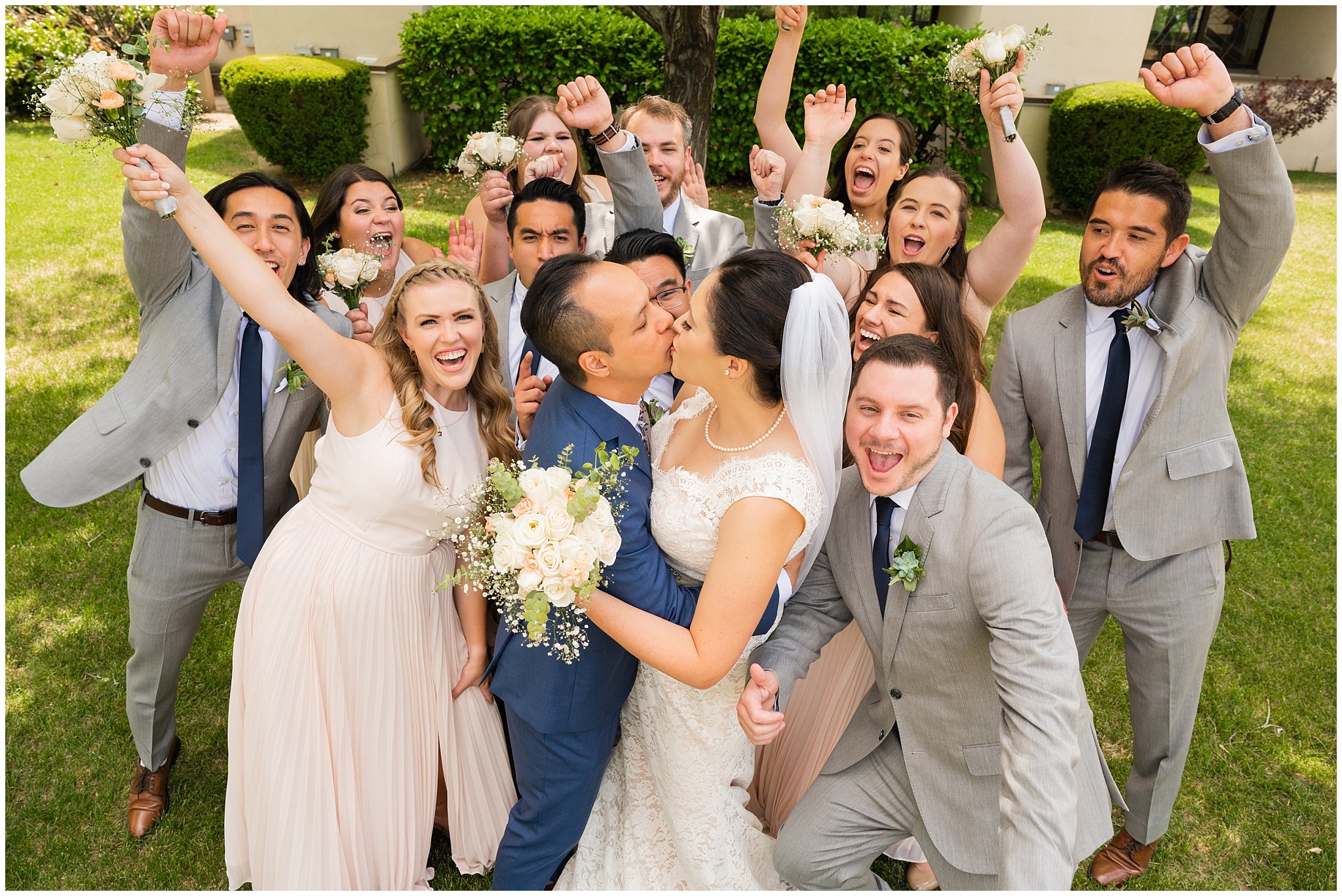 Wedding party portraits with groomsmen in blue and grey suits and bridesmaids in pink dresses | Cactus and Tropicals and Salt Lake Church Wedding | Jessie and Dallin Photography