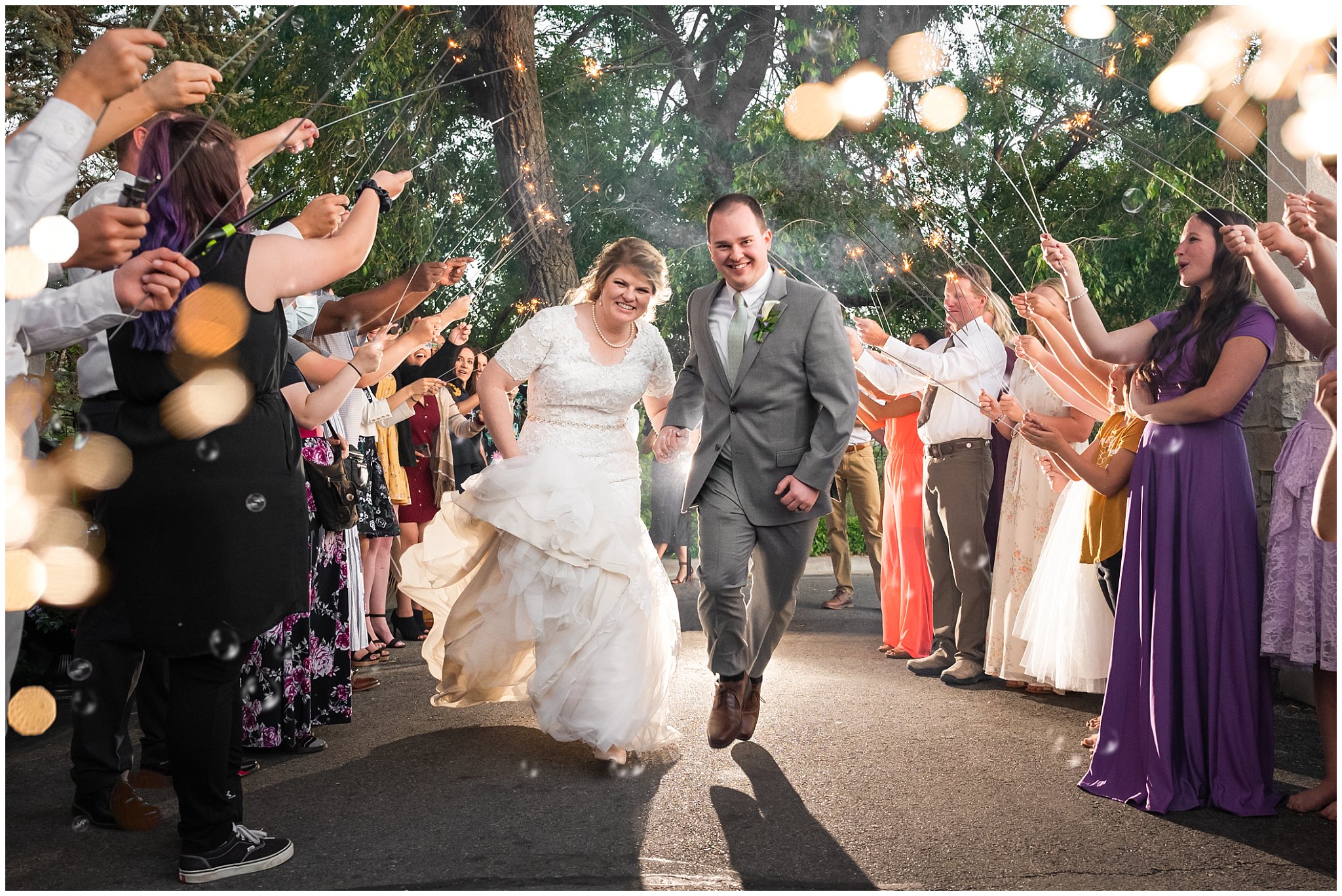 Sparkler and bubble exit | Oquirrh Mountain Temple and Millennial Falls Wedding | Jessie and Dallin Photography