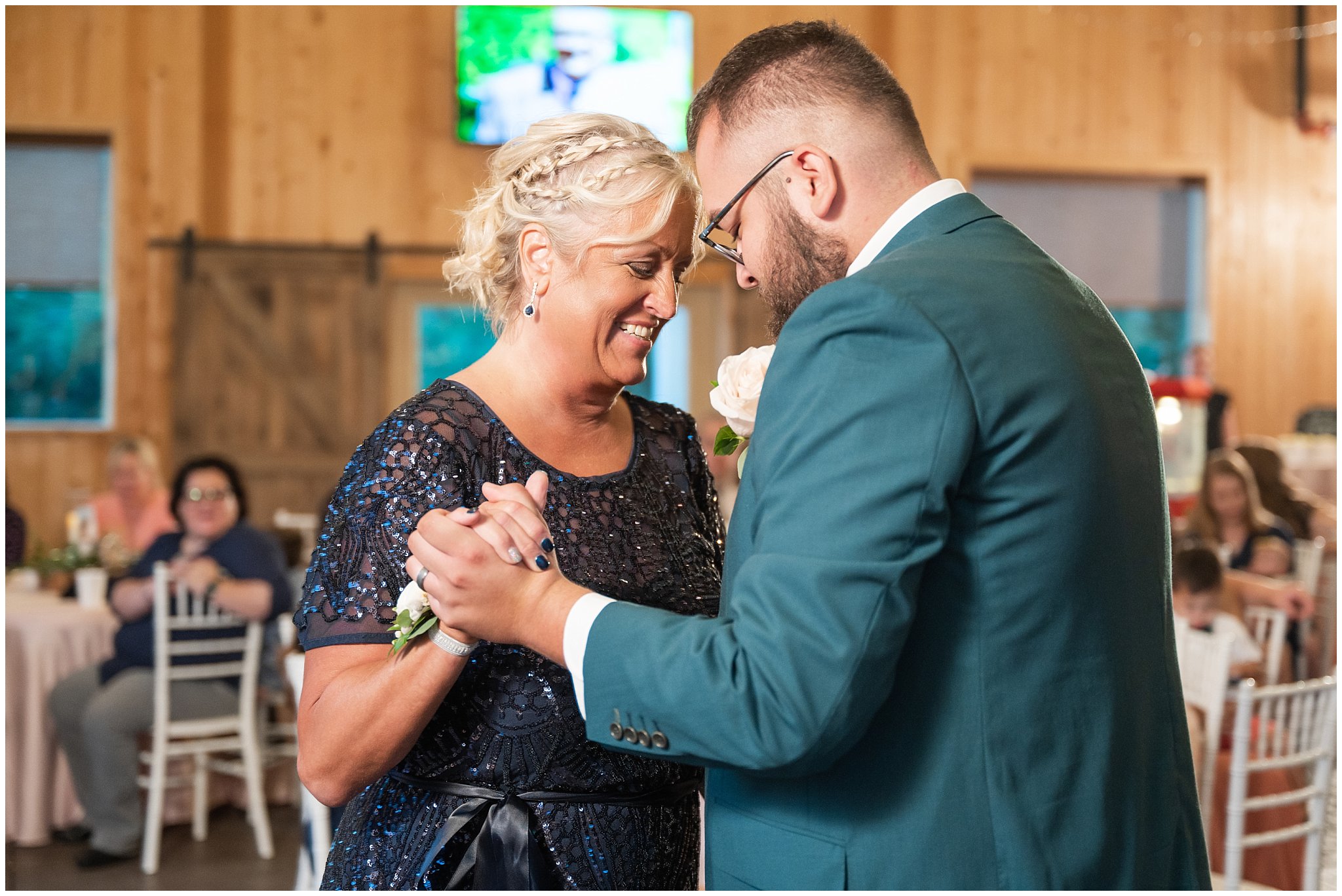 Dancing inside barn | Green and Salmon Pink Utah Wedding | Oak Hills | Jessie and Dallin Photography