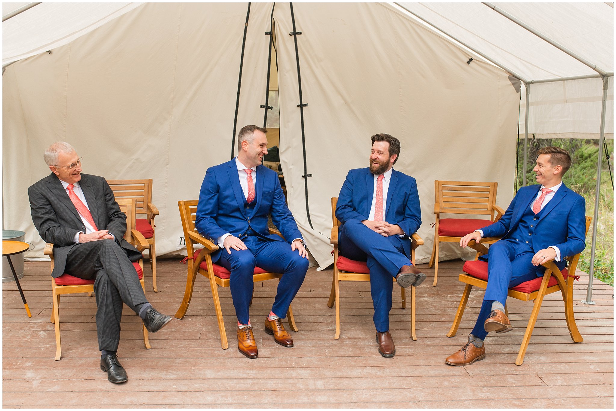 Groom and groomsmen getting ready outside canvas tent | Mountainside Weddings Kalispell Montana Destination Wedding | Jessie and Dallin Photography