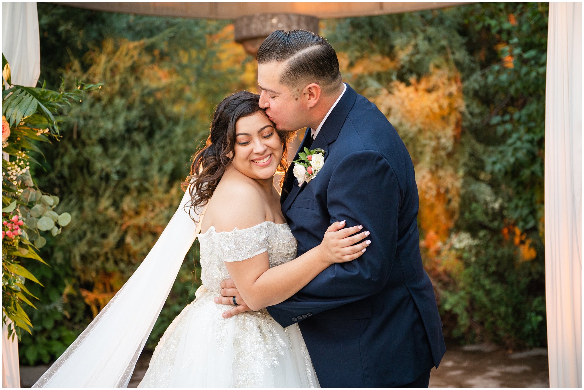 Bride and groom portraits in front of the Utah mountains with bride wearing long princess dress and long veil | Rustic Mountain Destination Wedding at Oak Hills Utah | Jessie and Dallin Photography