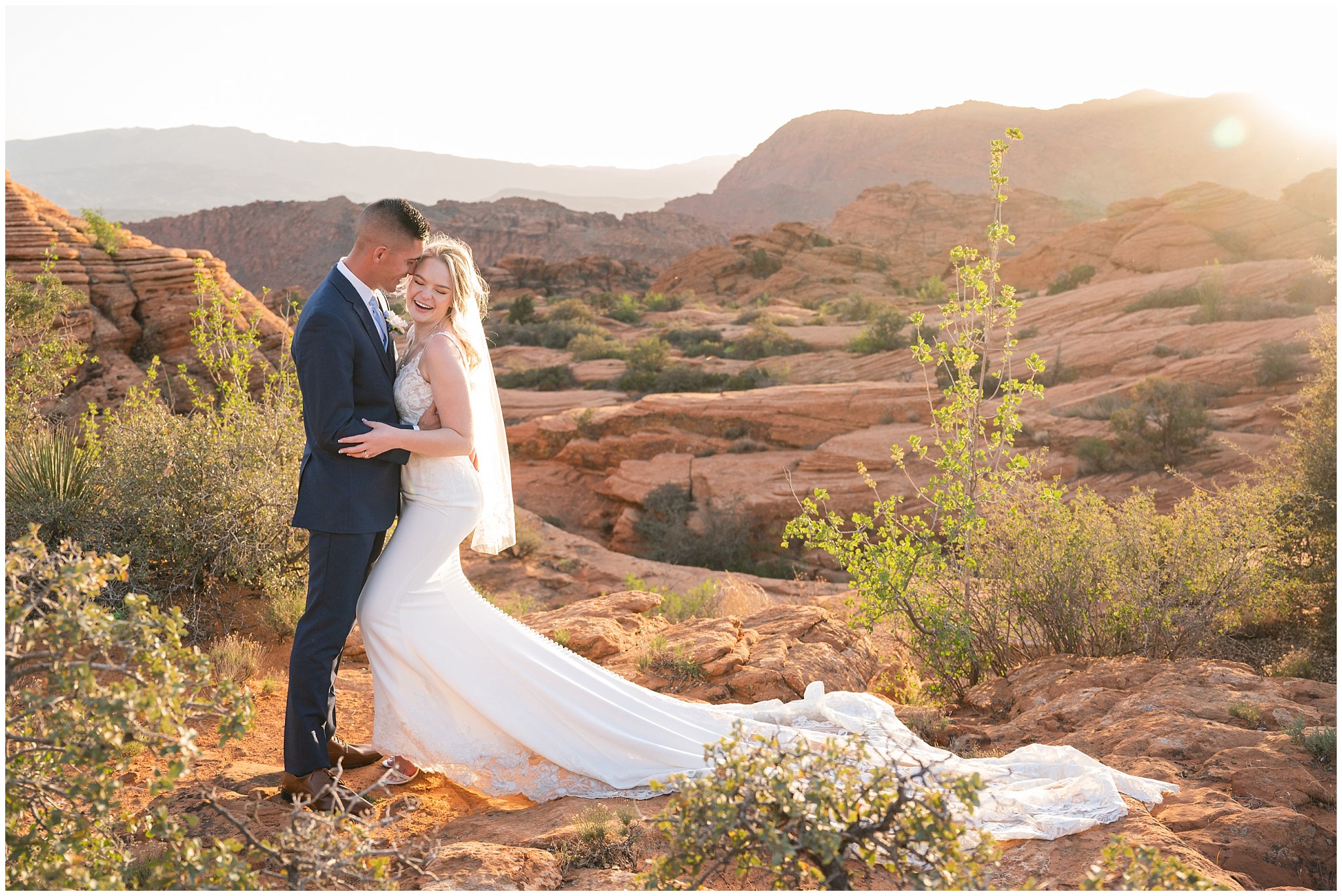 Wedding in the red rocks of southern Utah. Bride and groom wedding day portraits in the red rock.