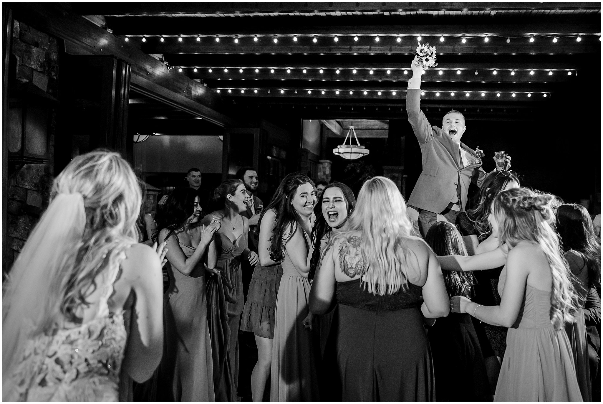 Wedding in the red rocks of southern Utah. Reception bouquet toss.