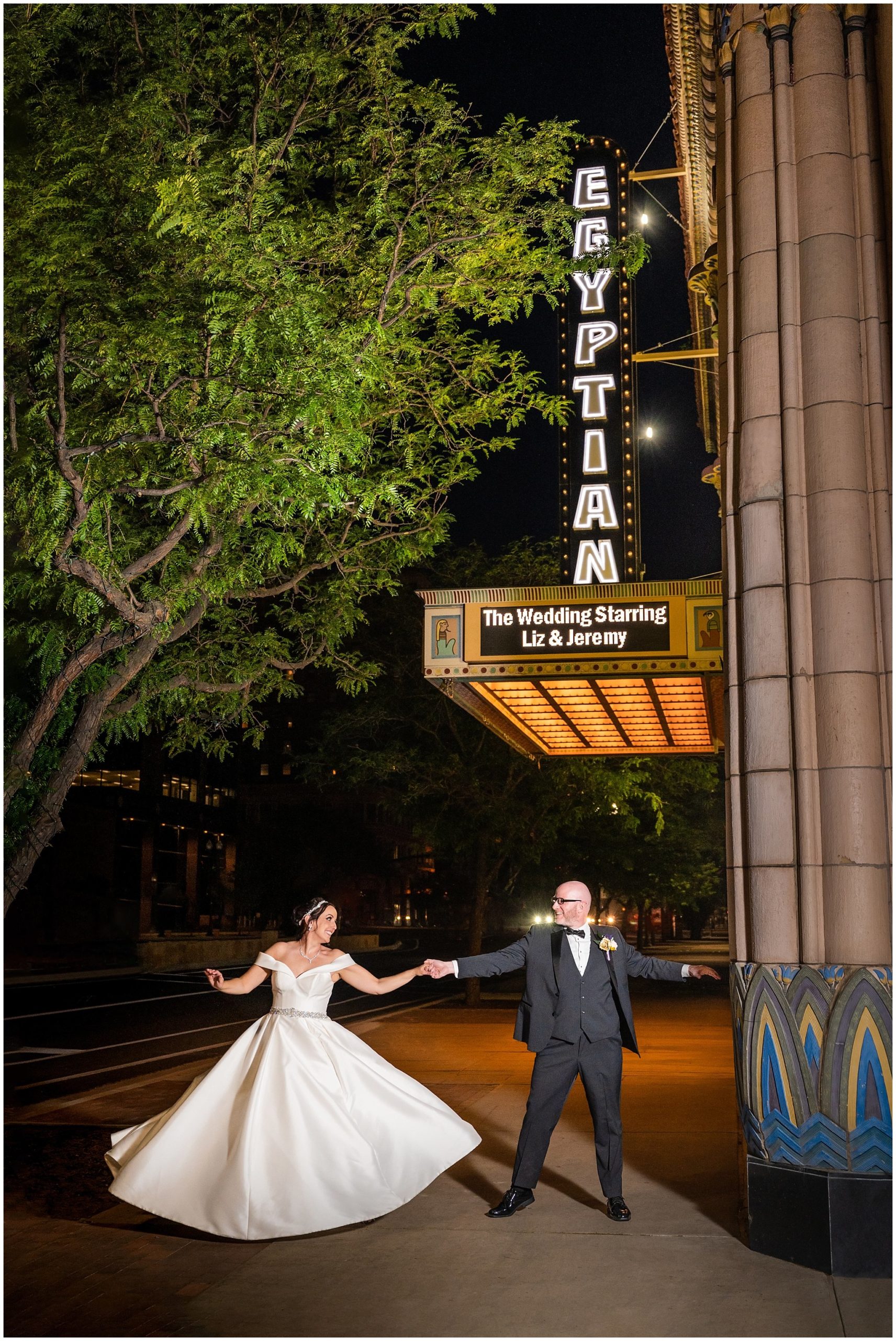 Night portraits of couple outside theater after dark | Broadway Musical Theatre Wedding
