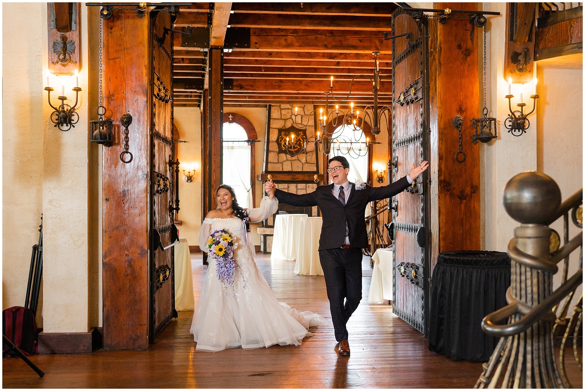 Grand entrance and toasts during dinner inside castle | Wadley Farms Spring Castle Wedding
