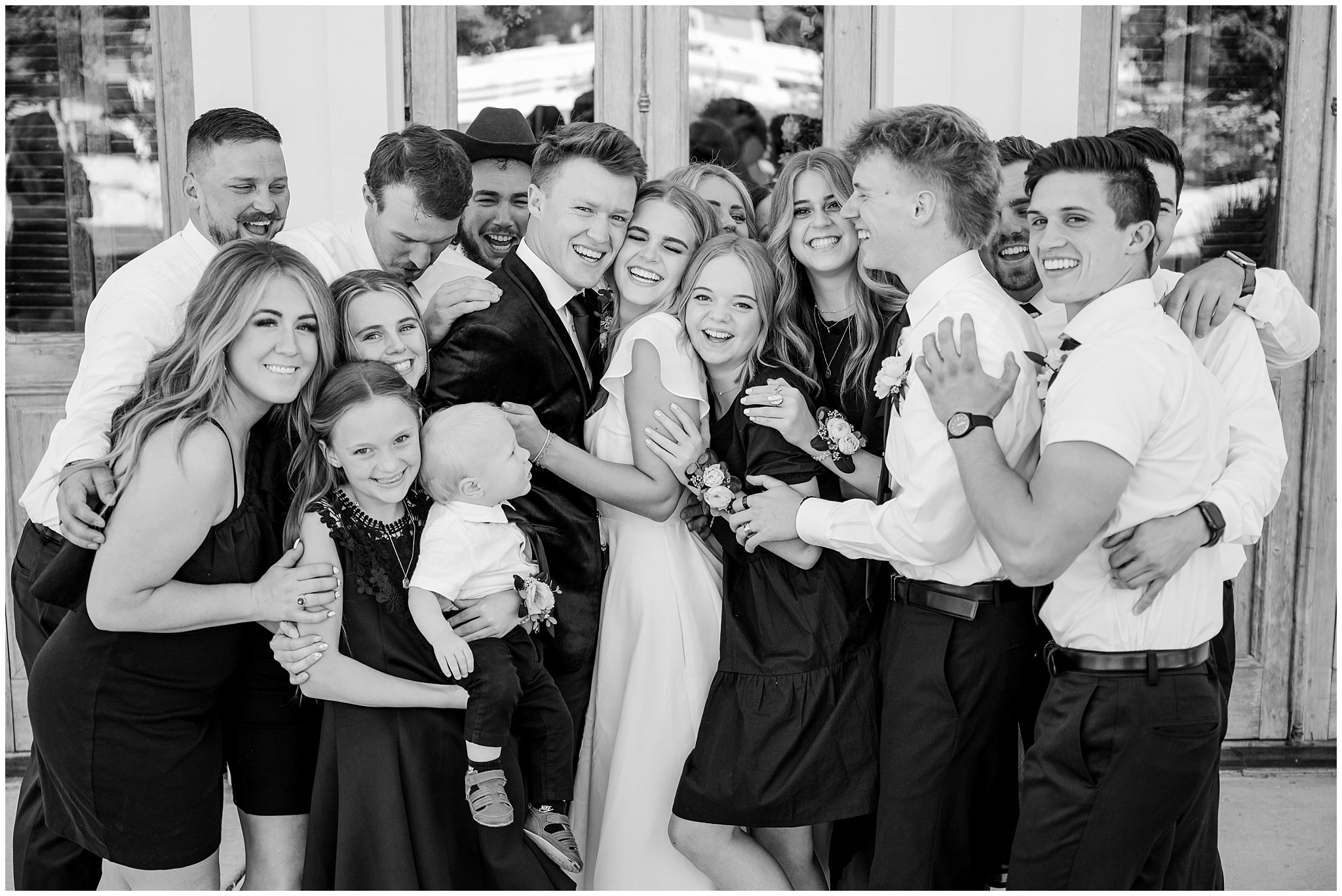 Wedding party portraits wearing black and white