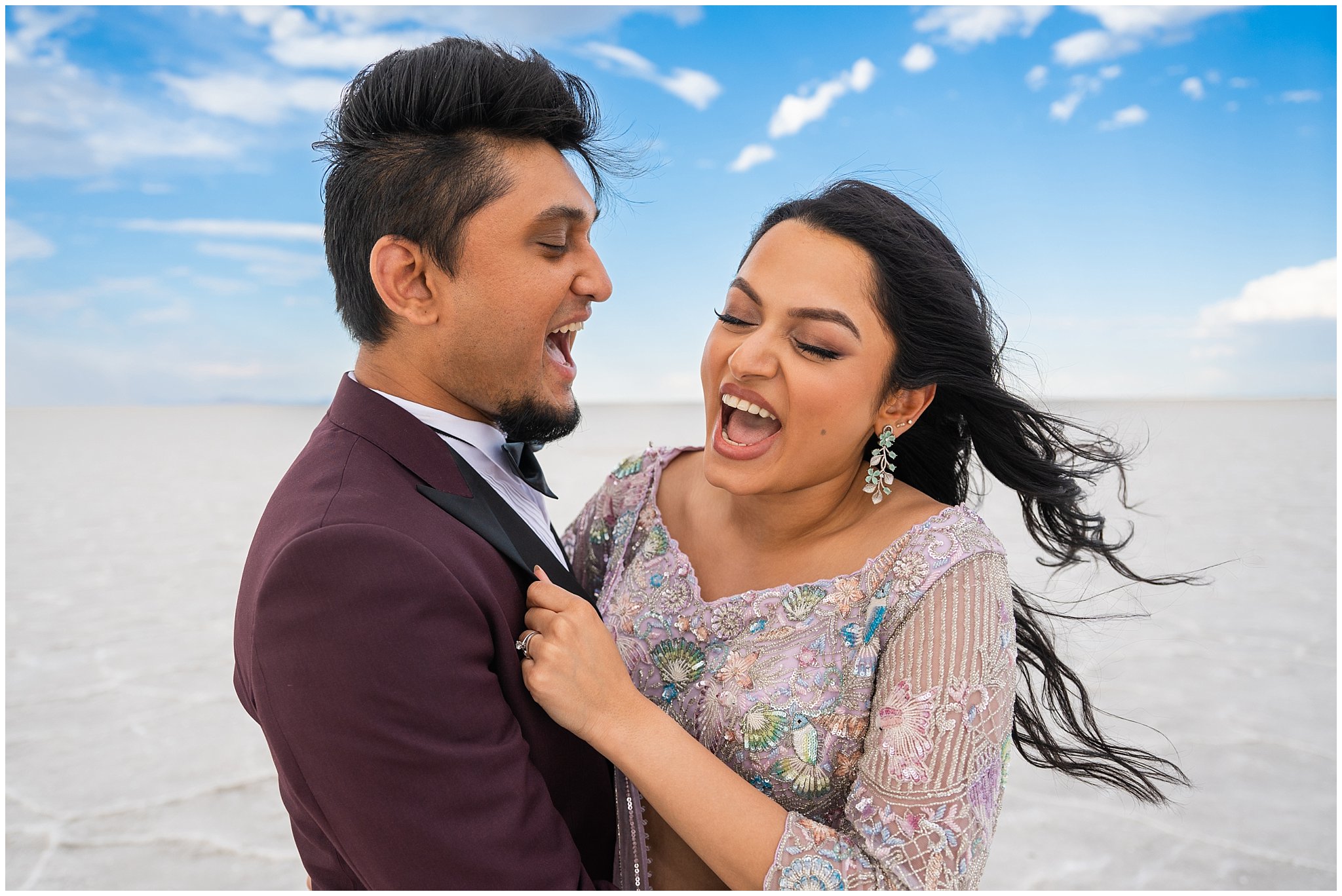 Couple laughing together | Indian wedding session at the Bonneville Salt Flats