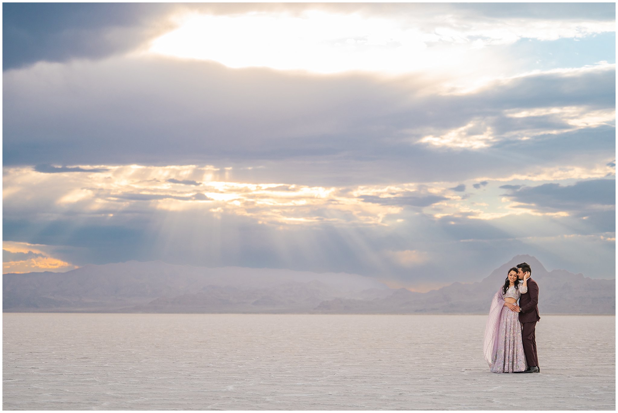 Couple together during their Indian wedding session at the Bonneville Salt Flats