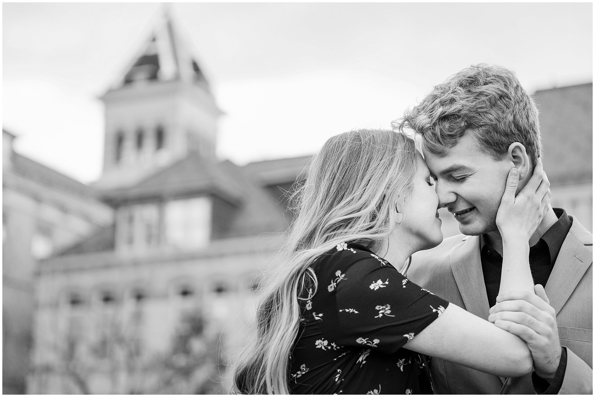 Couple standing on the Block A at sunset at Utah State University for their engagement photos in Logan, Utah | Cache Valley and Utah State University Engagement Session | Jessie and Dallin Photography