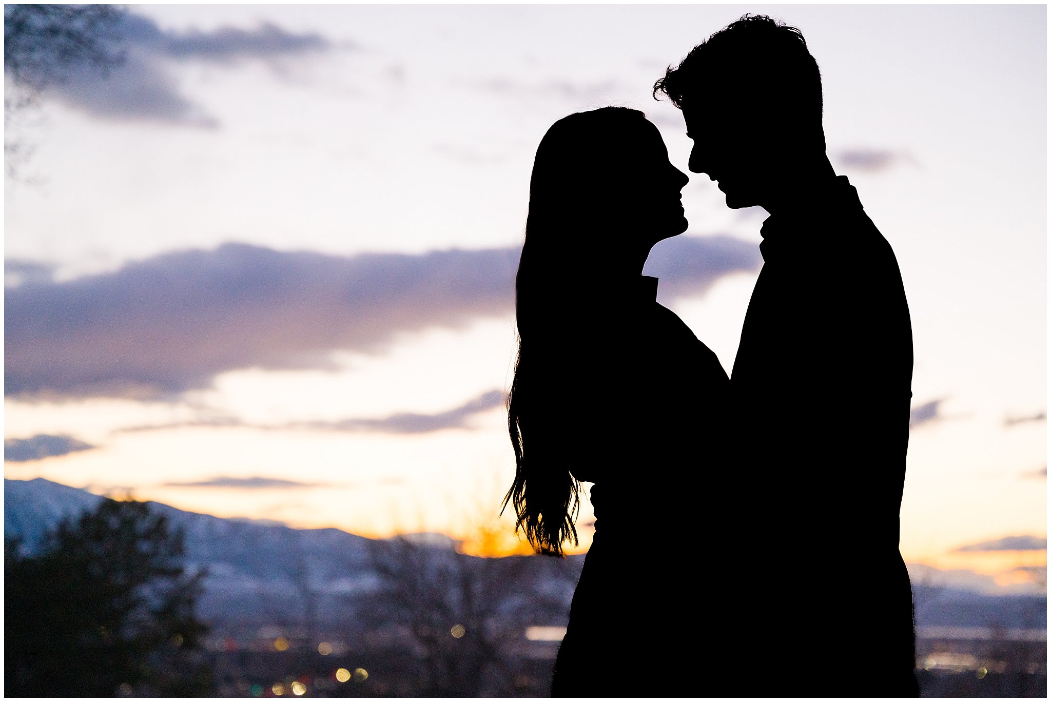 Couple near Old Main at sunset at Utah State University for their engagement photos in Logan, Utah | Cache Valley and Utah State University Engagement Session | Jessie and Dallin Photography