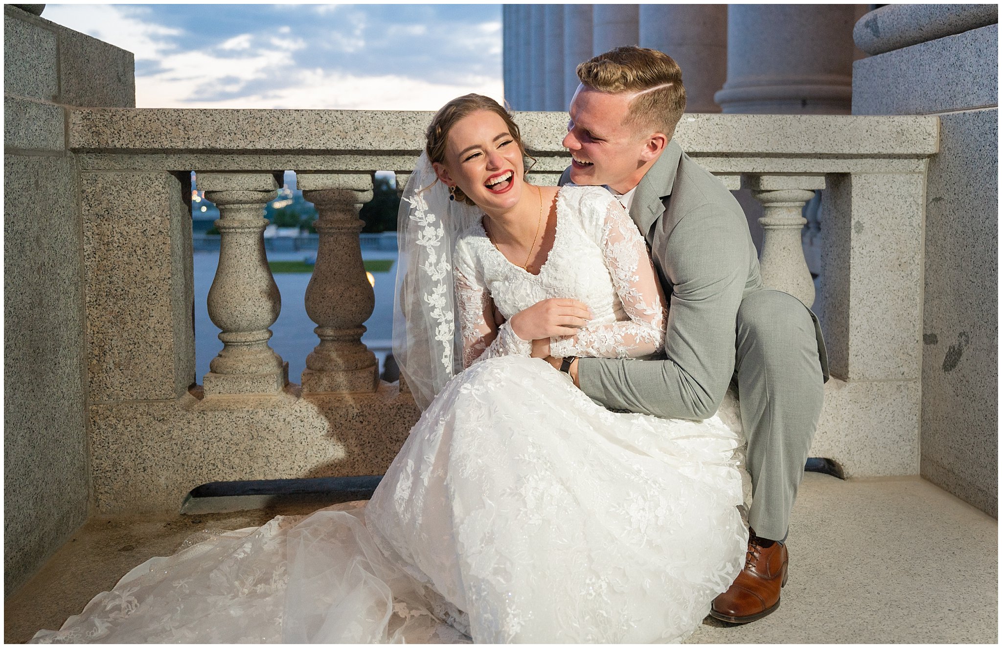 Bride and groom with long cathedral length veil sharing moments and laughter at sunset | Sunset Utah State Capitol Wedding Formal Session | Jessie and Dallin Photography