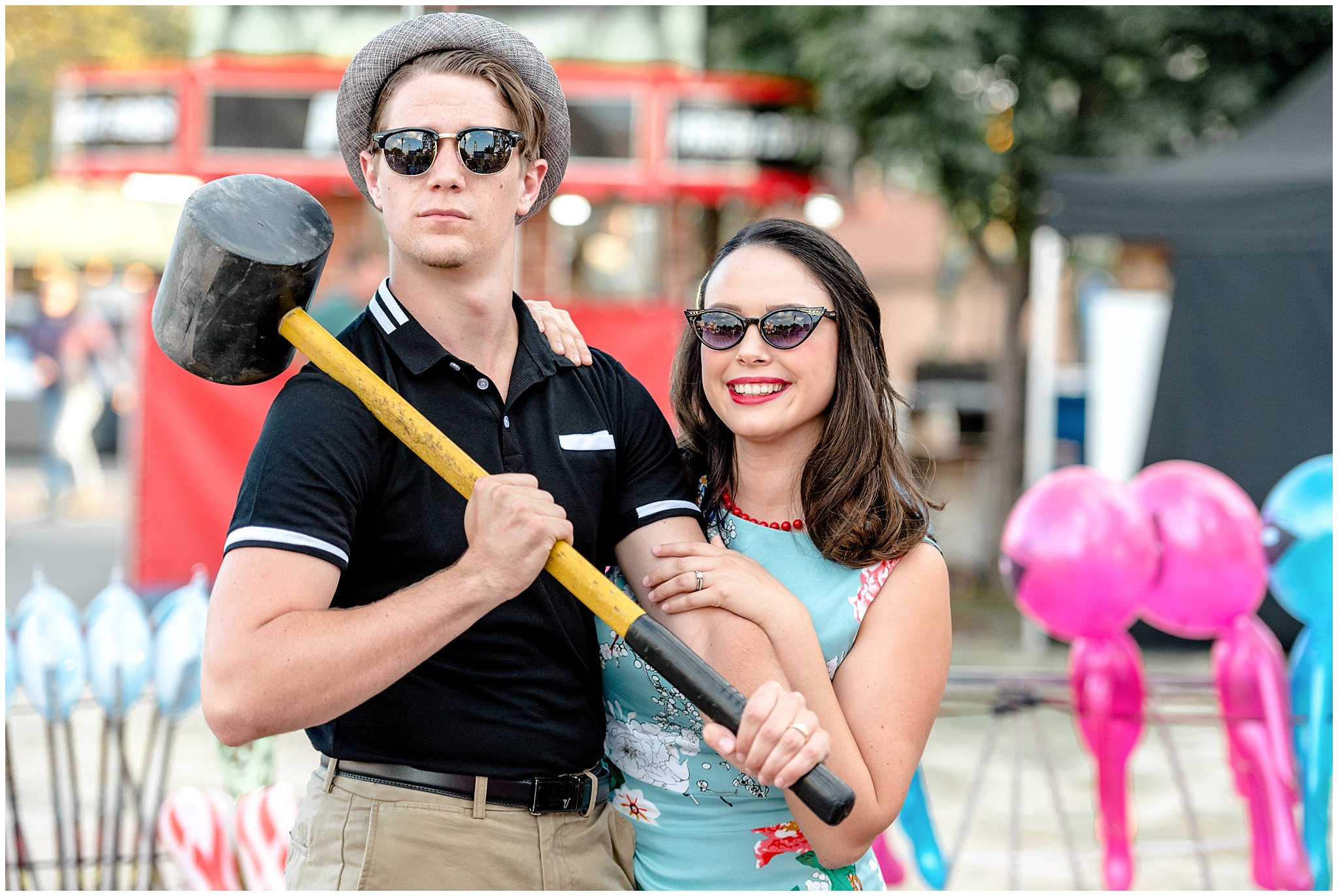 Couple plays carnival games at the state fair during their engagement session in Utah | Jessie and Dallin Photography | Utah Wedding Photographers