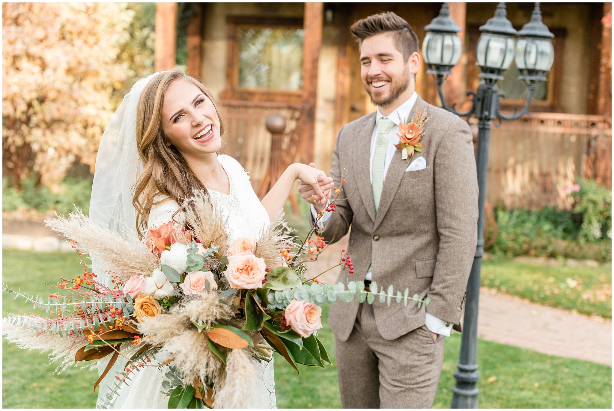 Bride and groom wearing lace dress and tan suit with modern large bouquet at Wadley Farms in Utah | Jessie and Dallin Photography
