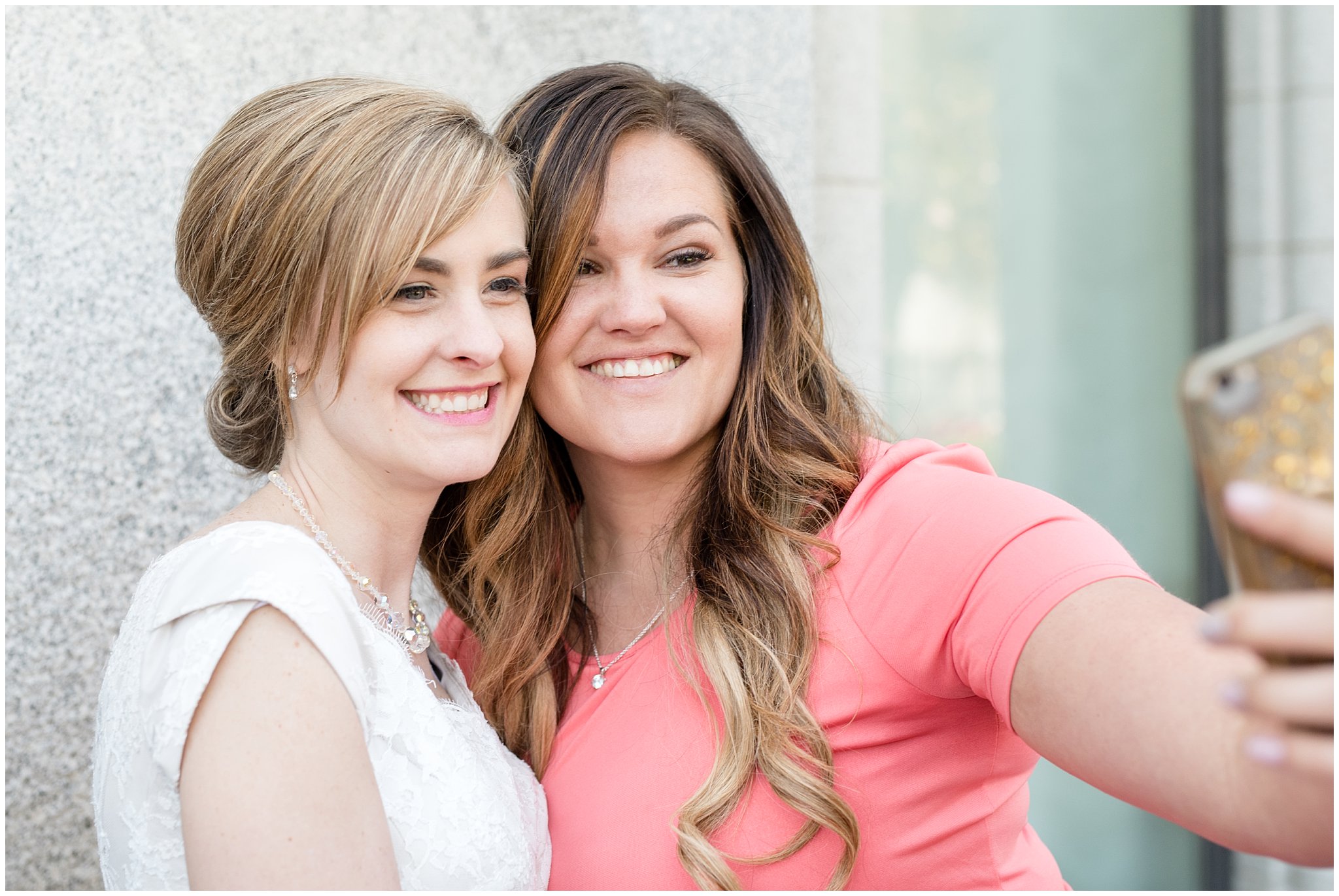 Salt Lake Temple candid wedding pictures | Coral and grey spring wedding