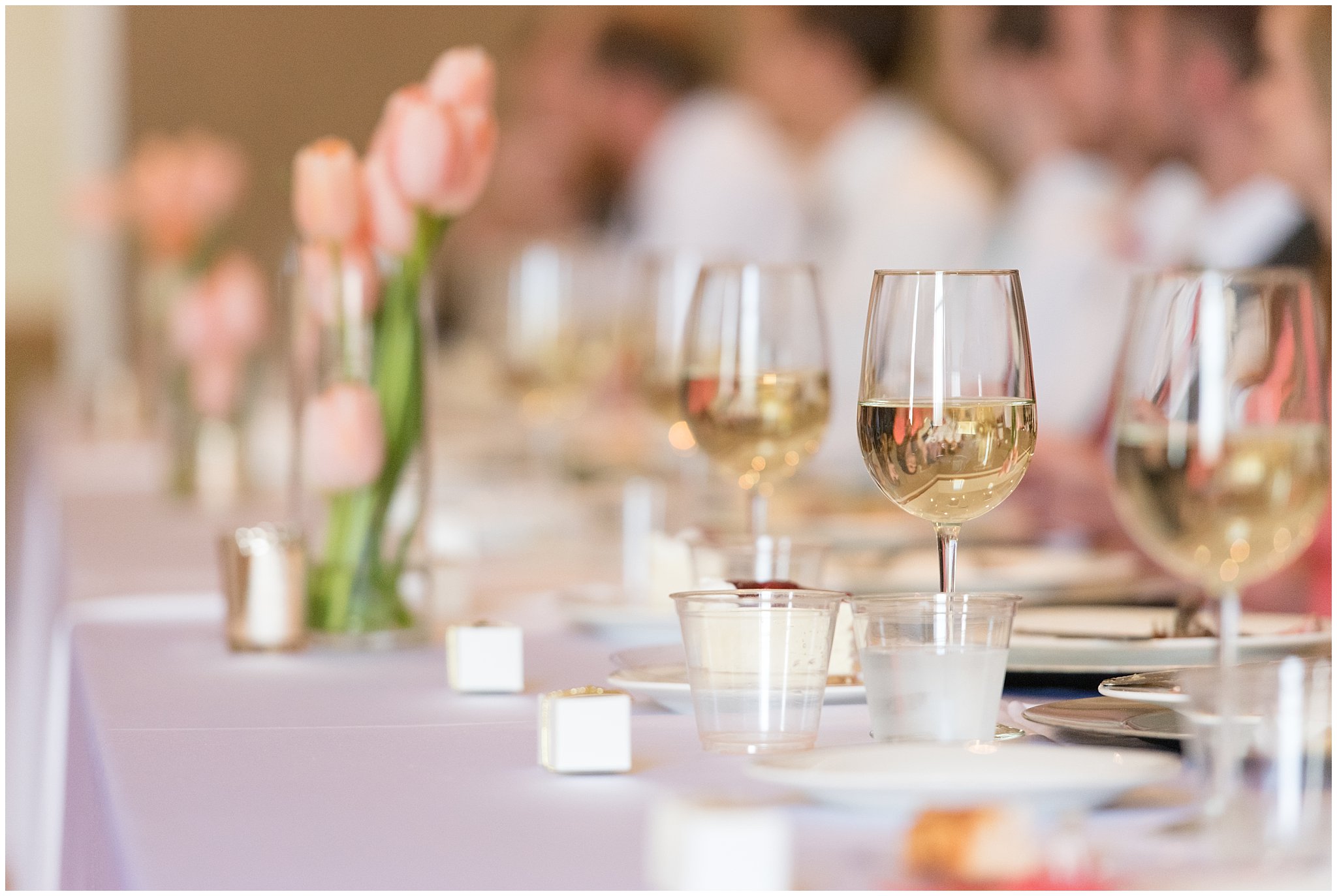 Utah wedding luncheon | wine glasses on table | coral and grey wedding