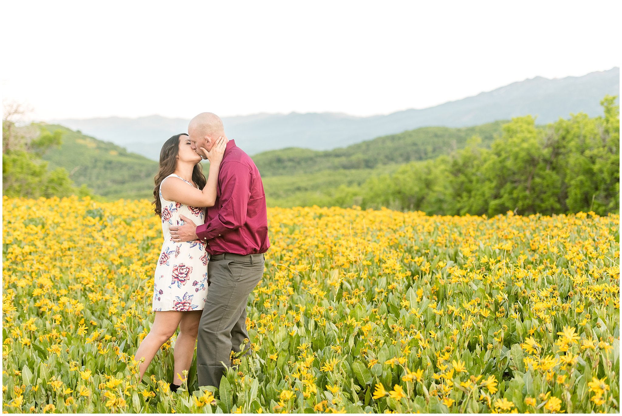 Couple engagement session in the mountains with wildflowers | Snowbasin Utah Engagements