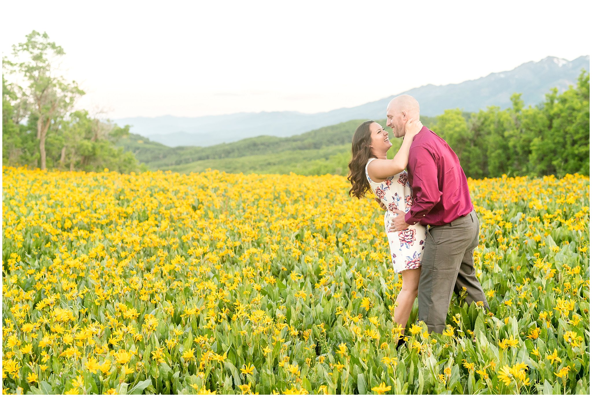 Couple's romantic engagement session in the mountains with wildflowers | Snowbasin Utah Engagements