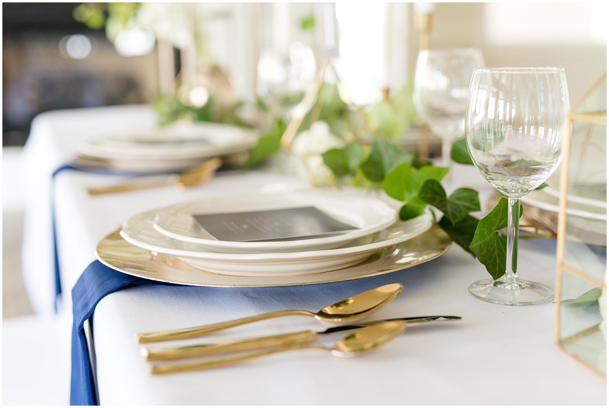Gold and white plates and gold tableware | Gold, navy and white wedding | Talia Event Center