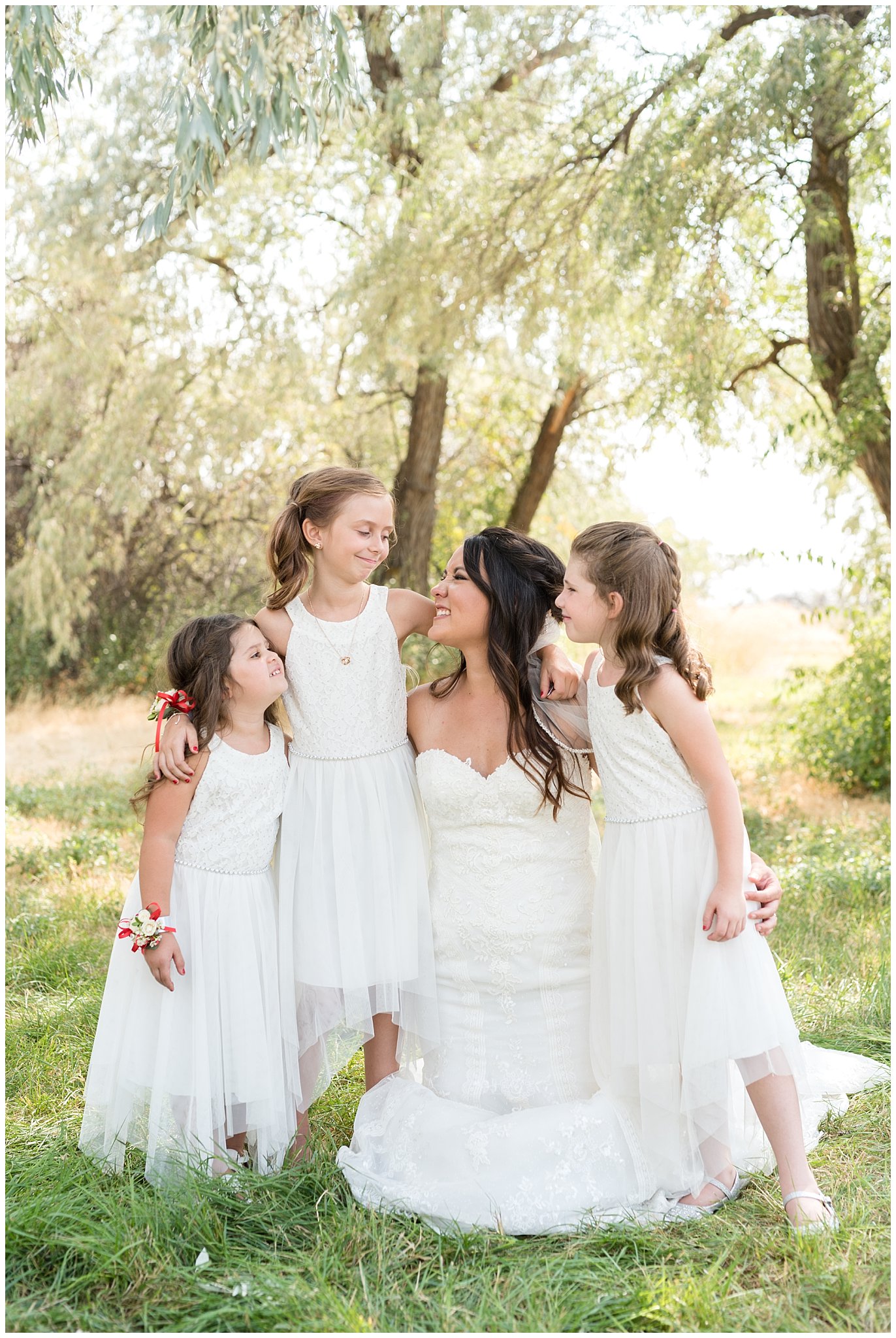 Red and white outdoor wedding | Bride and flower girls laughing | Davis County Outdoor Wedding | Jessie and Dallin Photography