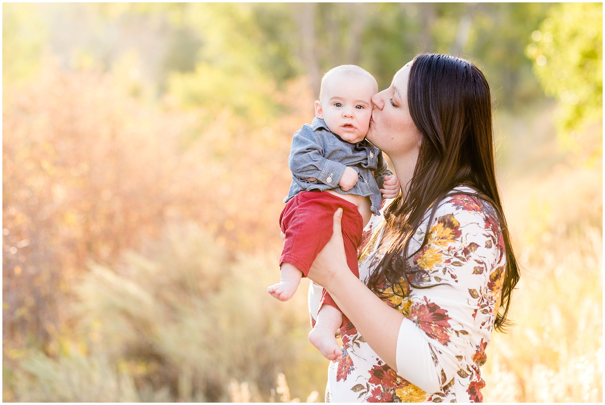 Mom kisses baby on the cheek | Fall Family Pictures at Snowbasin | Jessie and Dallin Photography