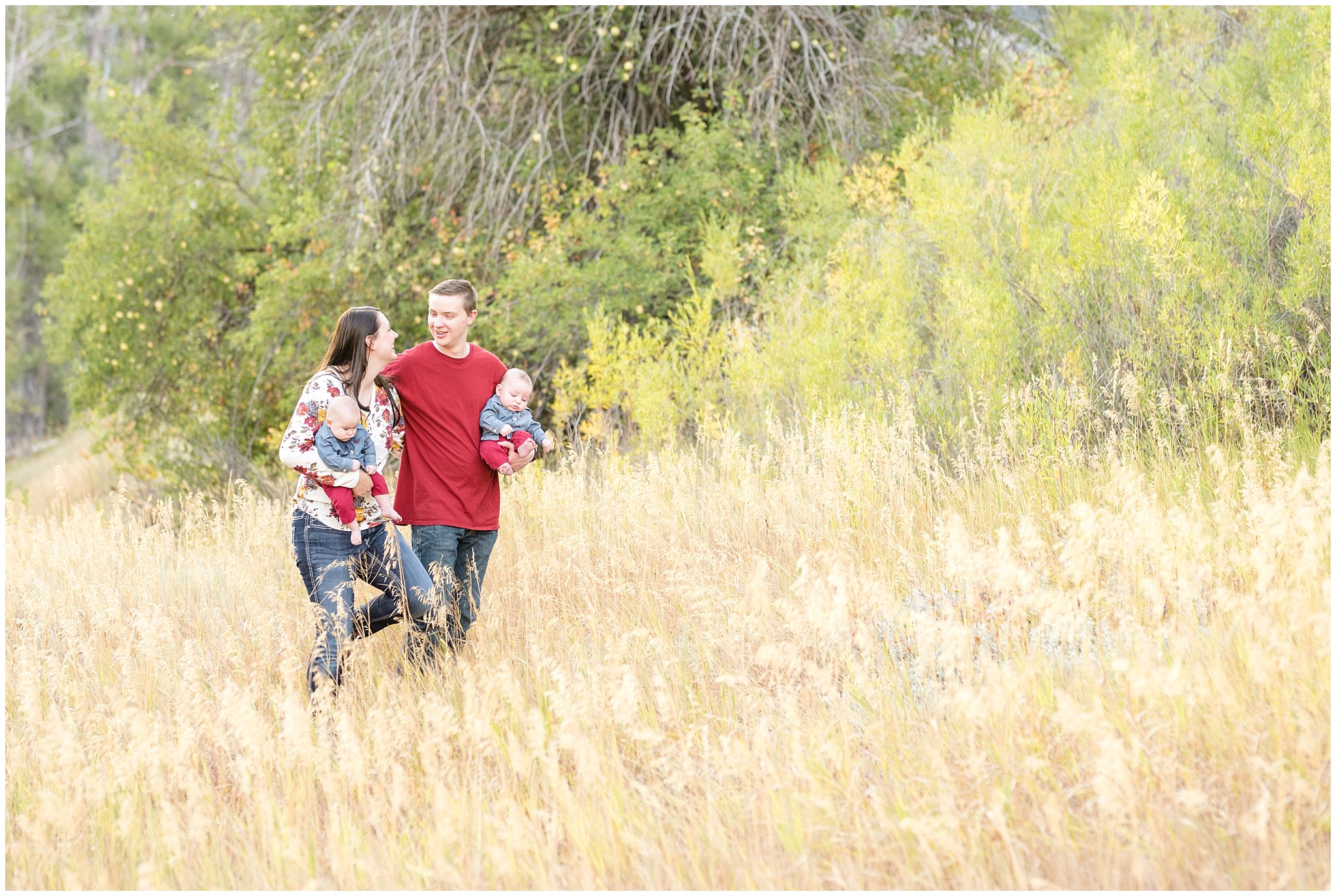 Family walks in the fall grass | Fall Family Pictures at Snowbasin | Jessie and Dallin Photography