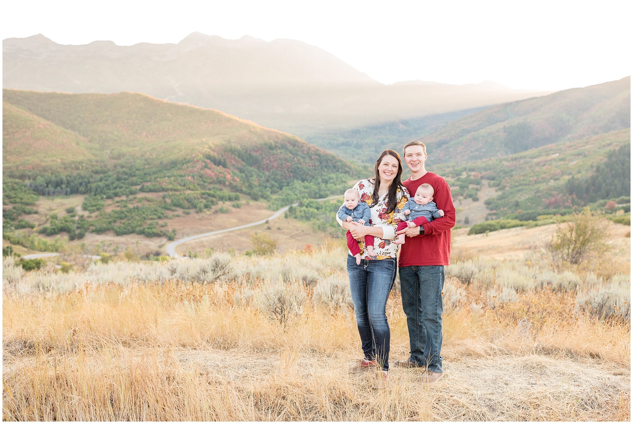 Family picture with mountains and rays of sunlight in the background | Fall Family Pictures at Snowbasin | Jessie and Dallin Photography
