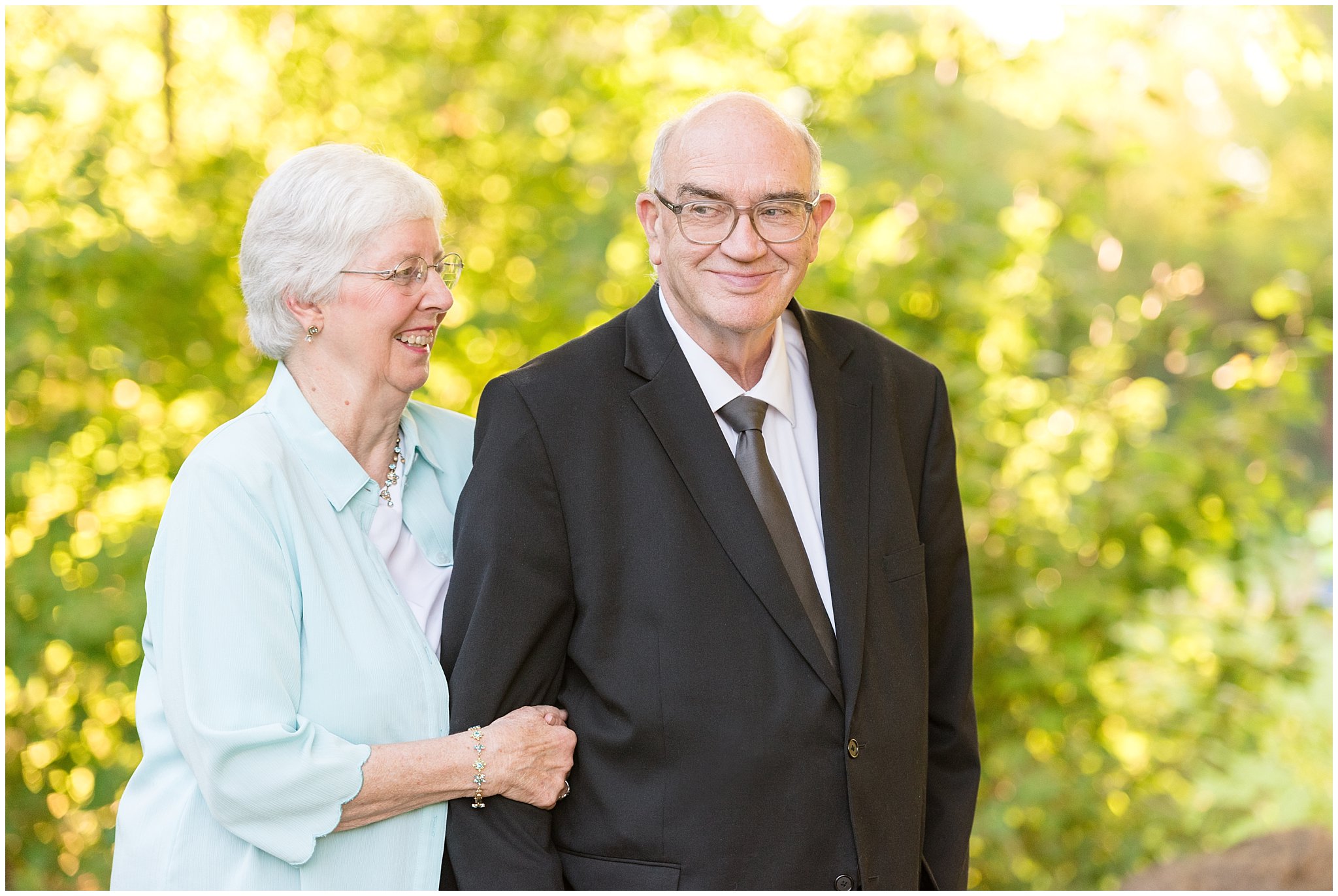 Grandpa pulling a face and grandma laughing | Layton Commons Park | Layton Couples Photographer | Jessie and Dallin