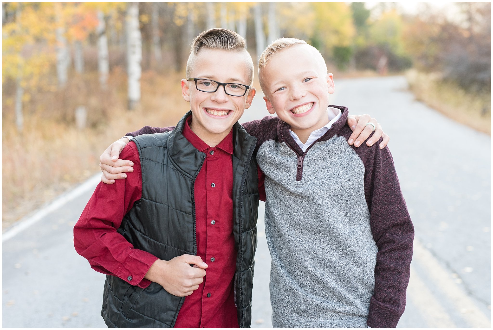 Twin brothers smiling at the camera | Fall Family Pictures in the Mountains | Snowbasin, Utah | Jessie and Dallin Photography