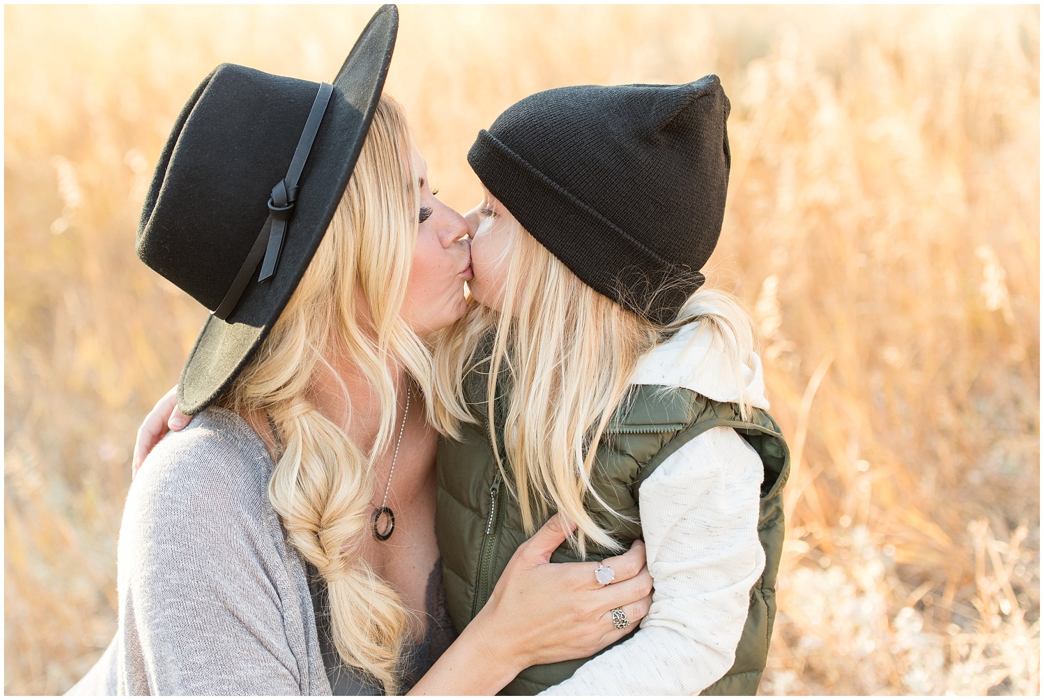 Son giving mom a kiss during fall family pictures | Fall Family Pictures in the Mountains | Snowbasin, Utah | Jessie and Dallin