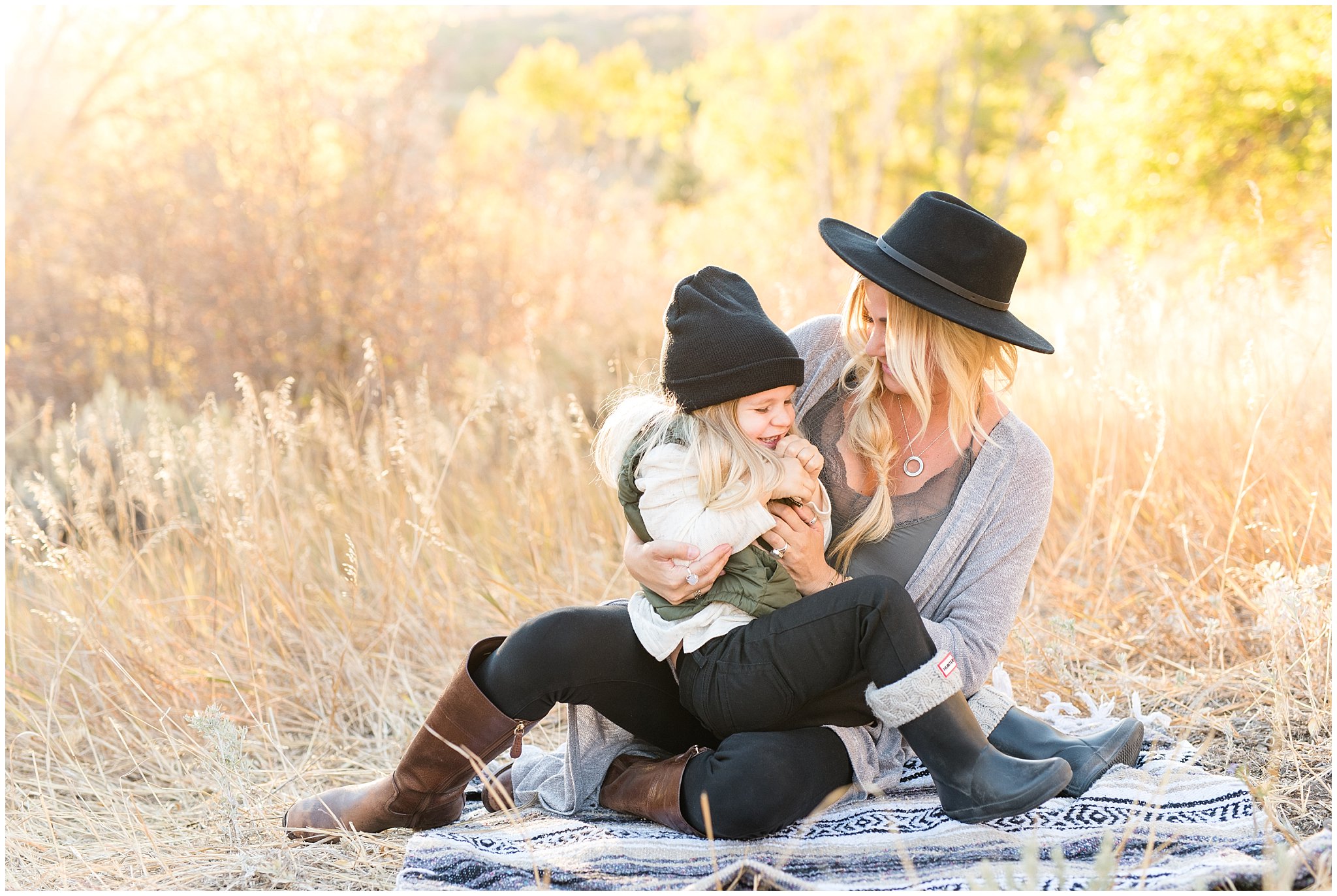 Mom tickling son during fall family pictures | Fall Family Pictures in the Mountains | Snowbasin, Utah | Jessie and Dallin
