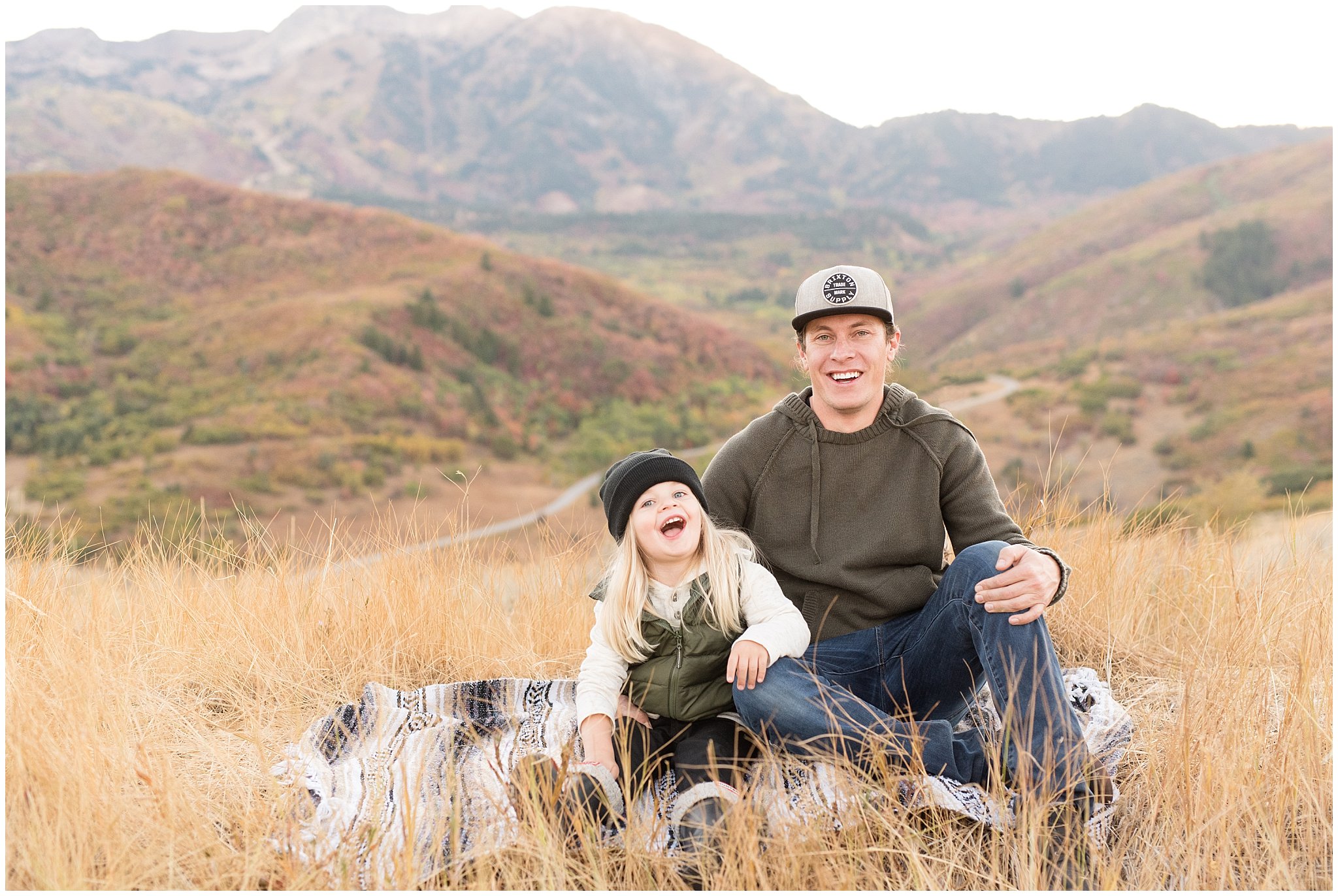 Father and son in from of fall mountain view | Fall Family Pictures in the Mountains | Snowbasin, Utah | Jessie and Dallin